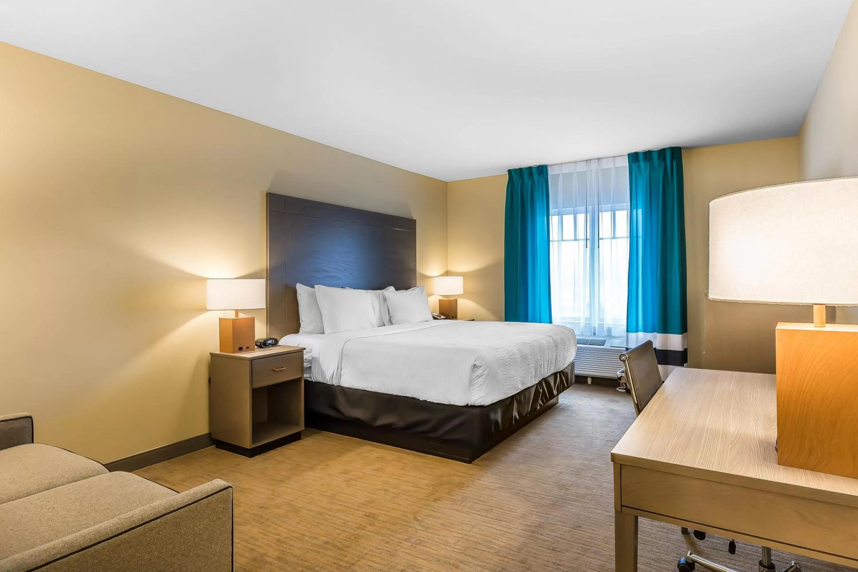 Bed in Marina Bay Hotel & Suites, an Ascend Collection Hotel