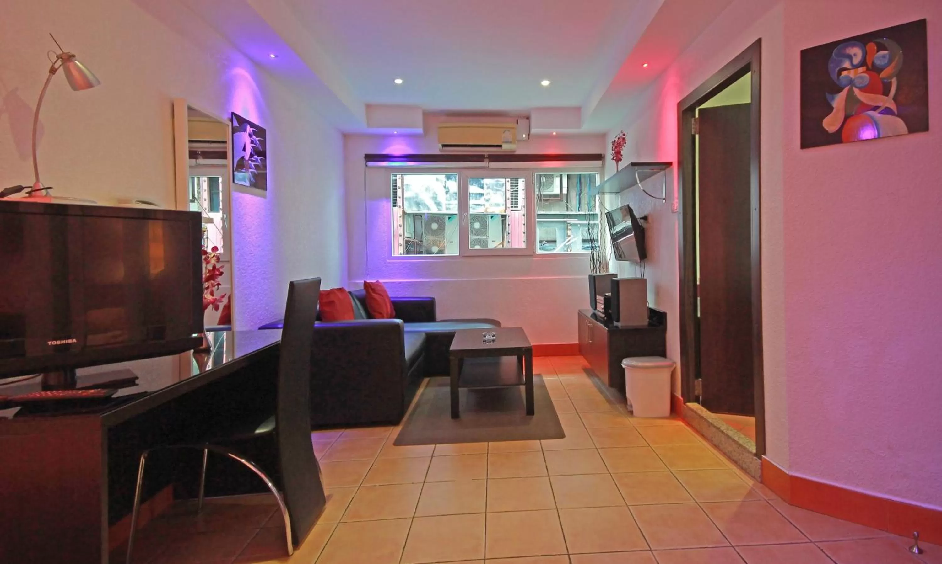 Seating area, TV/Entertainment Center in Swiss Food Restaurant and room for rent