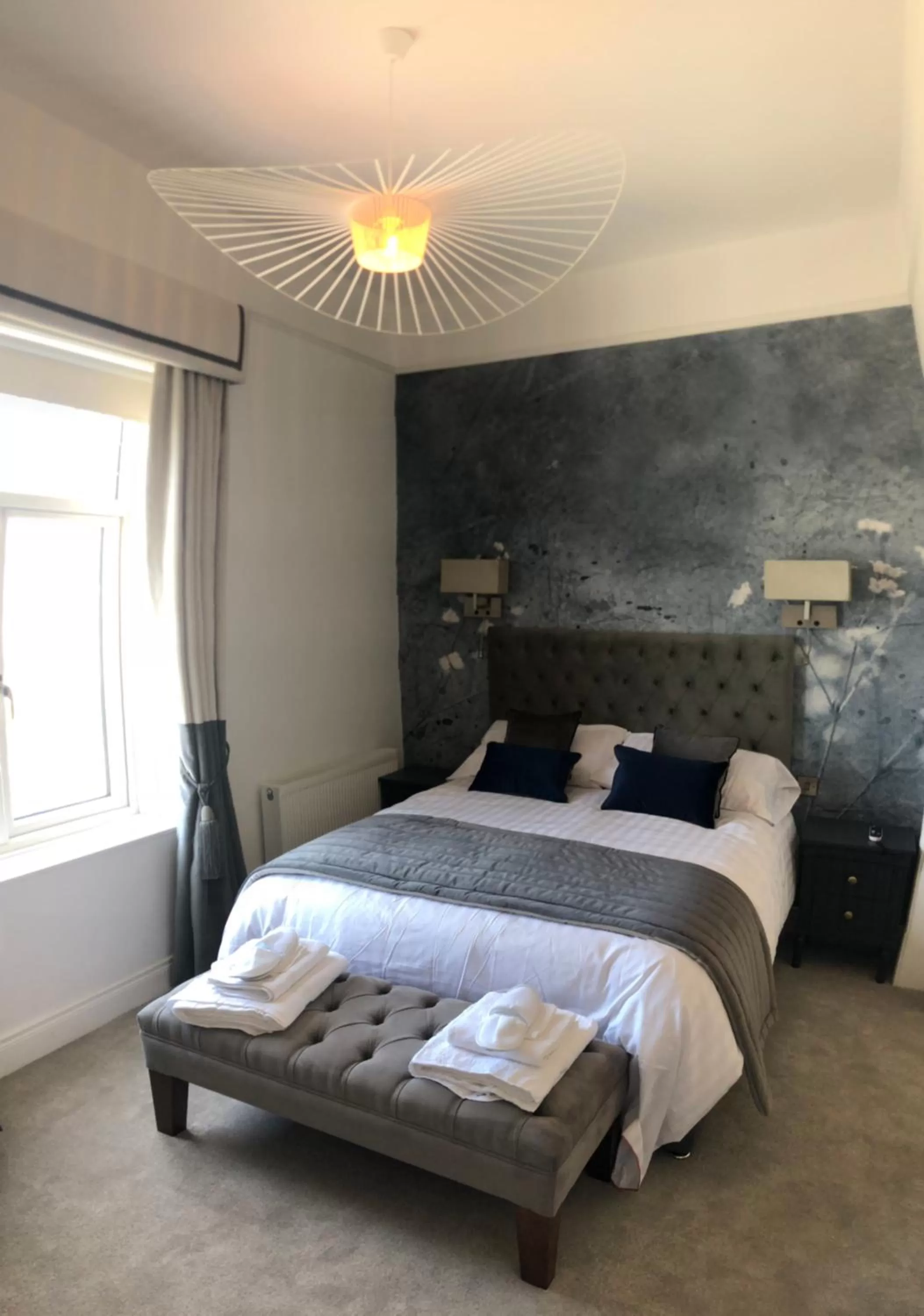 Photo of the whole room, Bed in The Strand Hotel, the former residence of Oscar Wilde