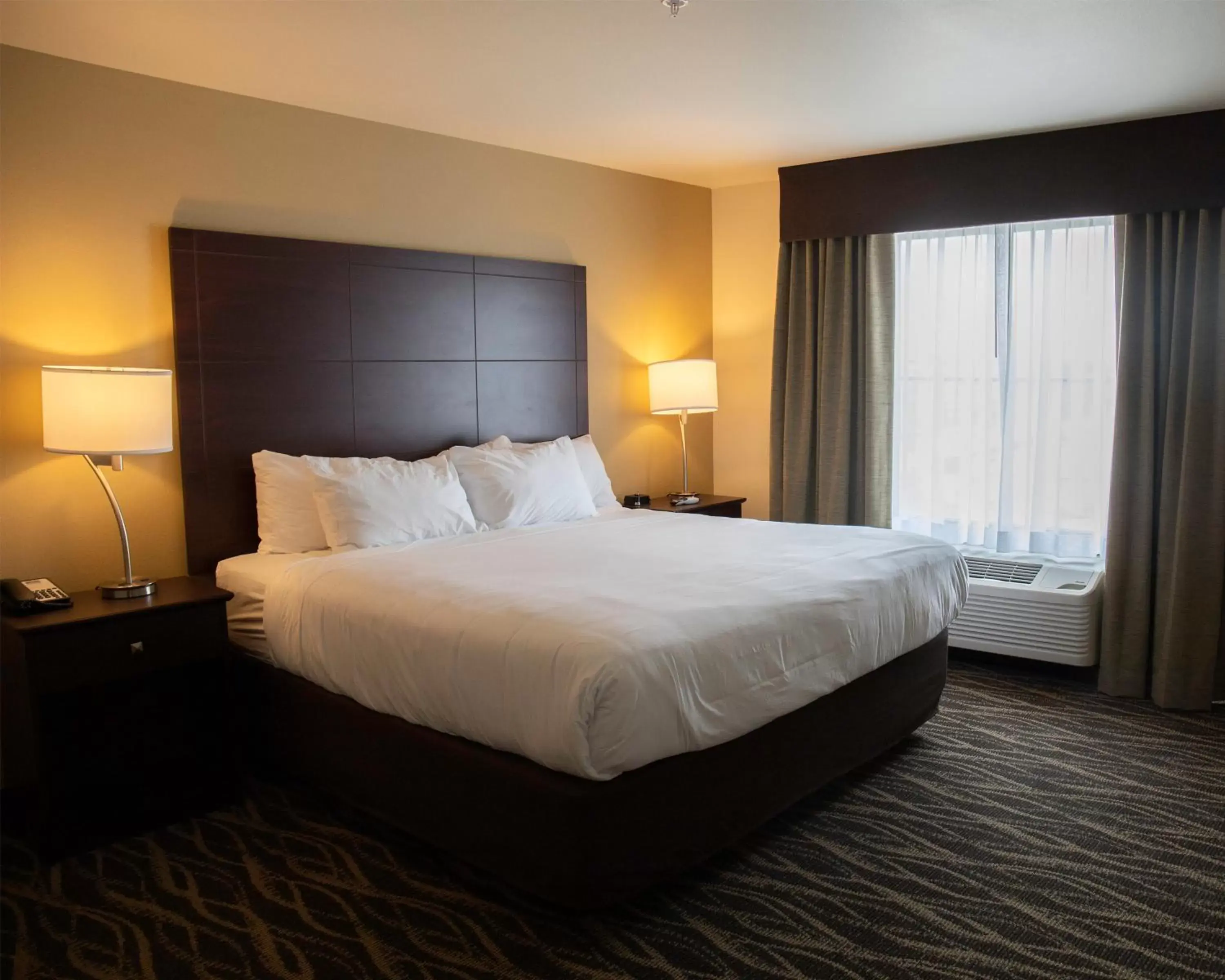 King Room - Disability Access in Cobblestone Hotel & Suites - Two Rivers King Room - Disability Access in Cobblestone Hotel & Suites - Two Rivers