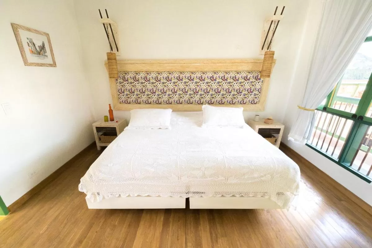 Bed in El Despertar Hotel