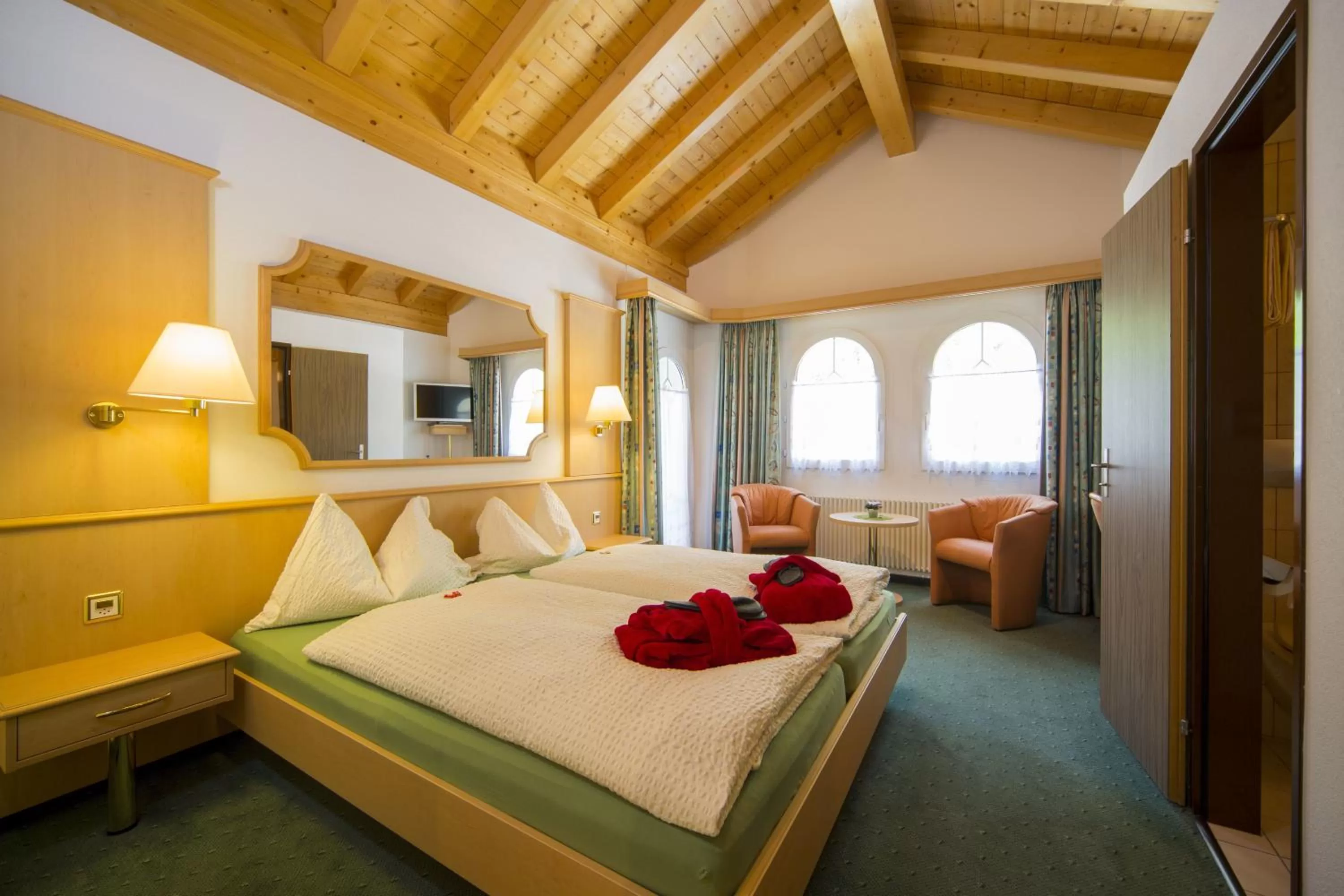 Photo of the whole room, Bed in Wellness- und Schneesporthotel Christiania