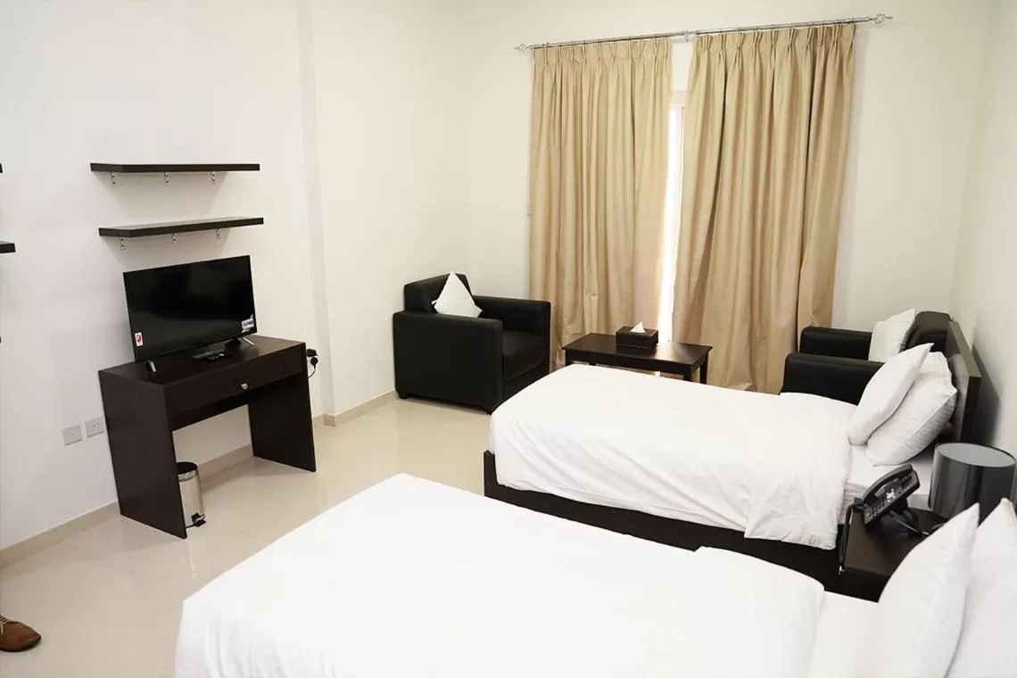 Bed in Aurak Guest House