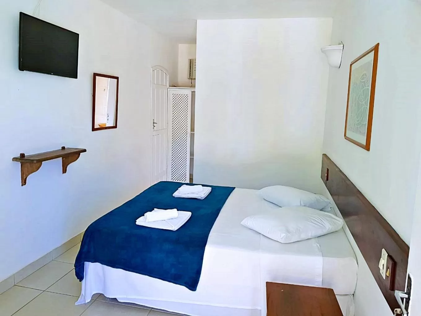 Bed in Pousada Estrela de Paraty