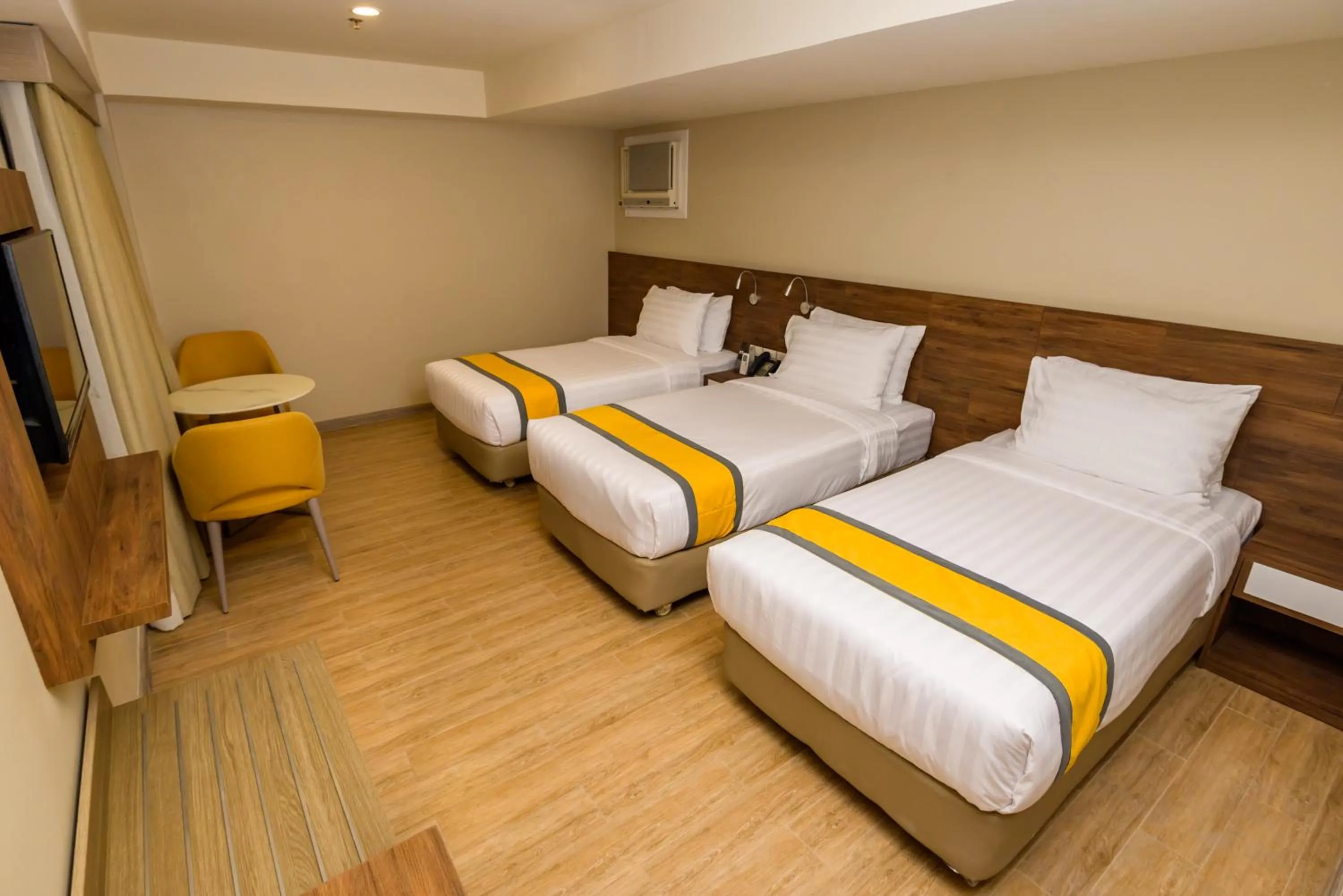 Bed in SureStay Plus by Best Western Cebu City