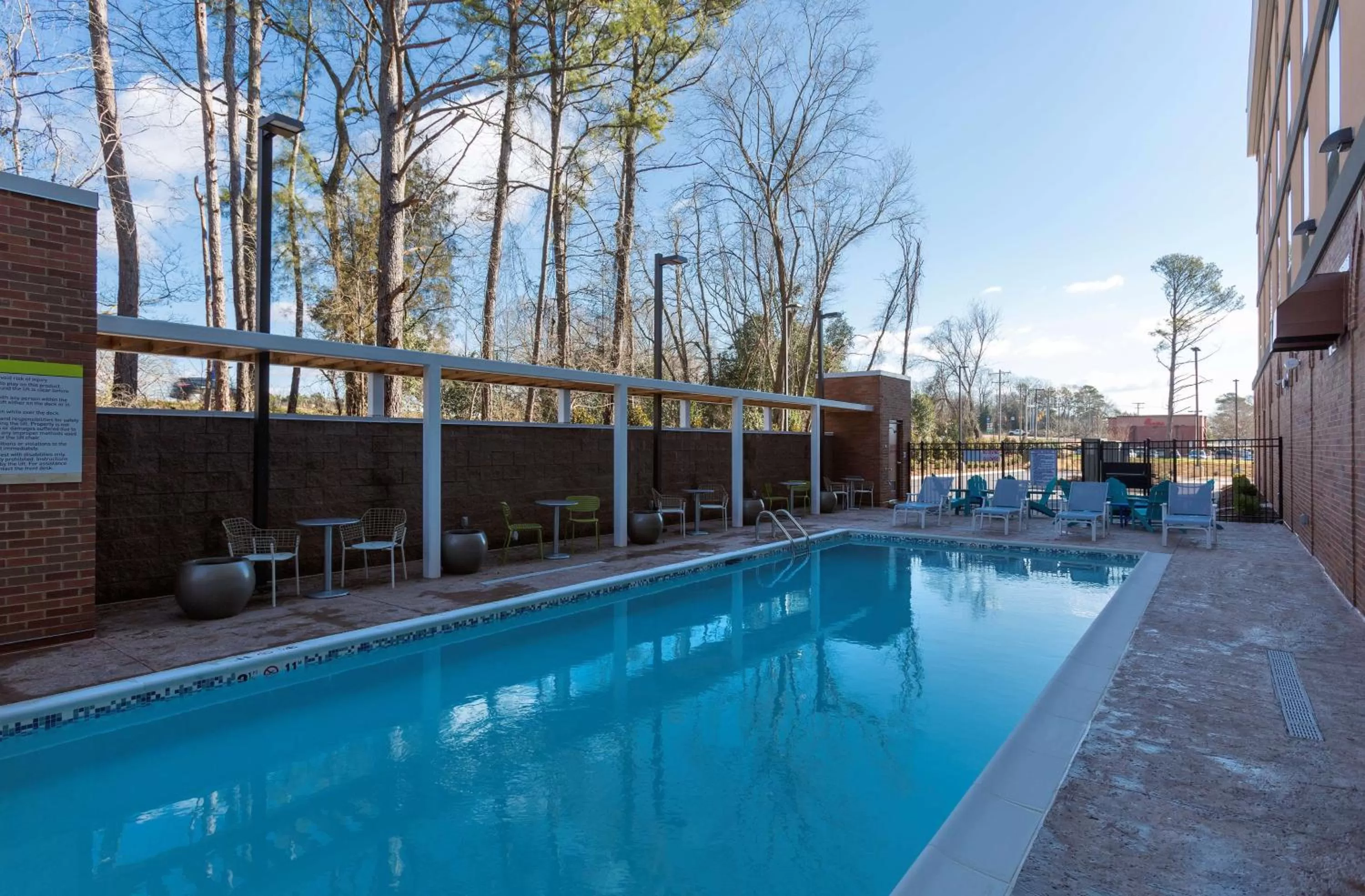 Pool view in Home2 Suites By Hilton Charlotte Belmont, Nc