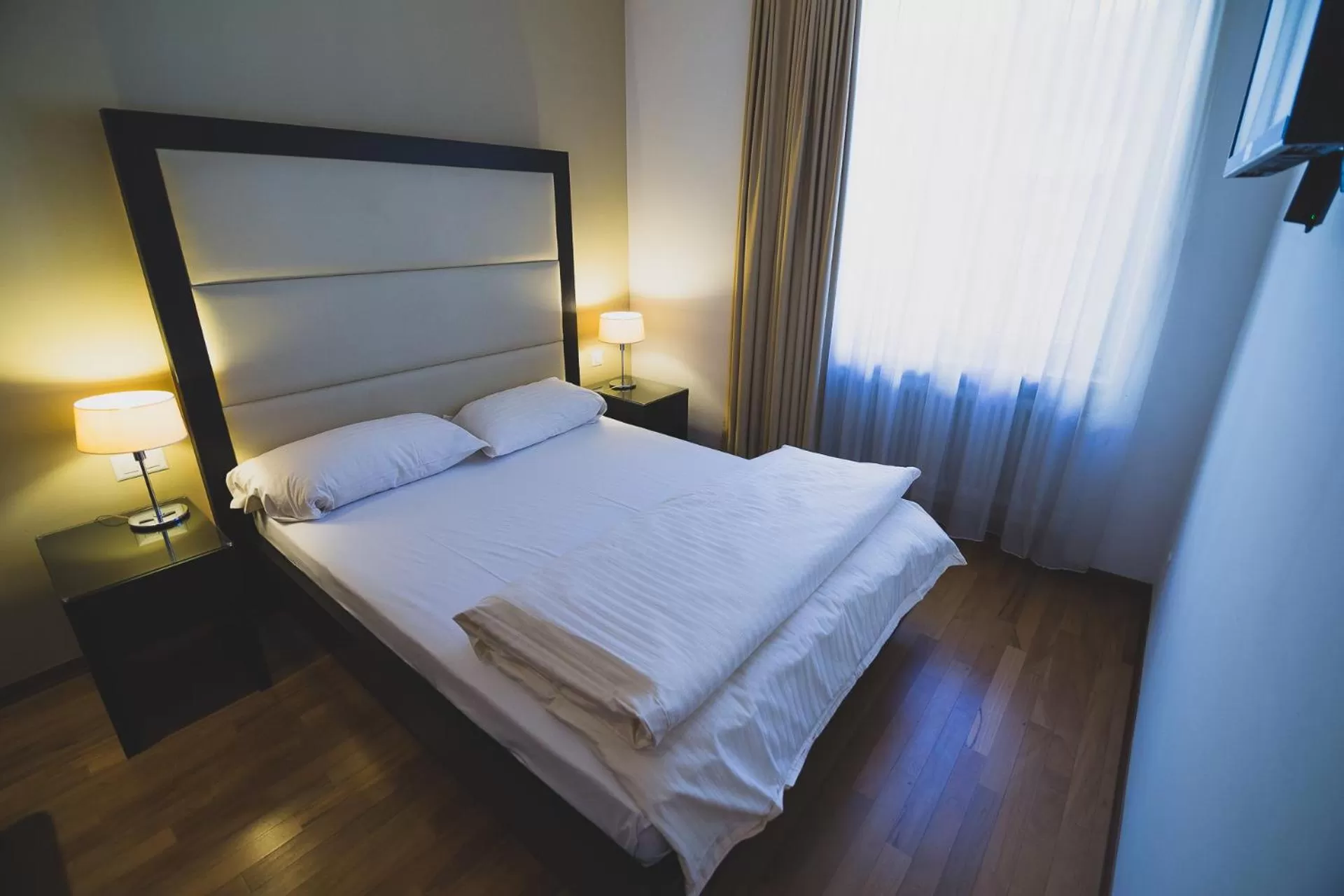 Bed in Enjoy 1313AG Hotel Touring