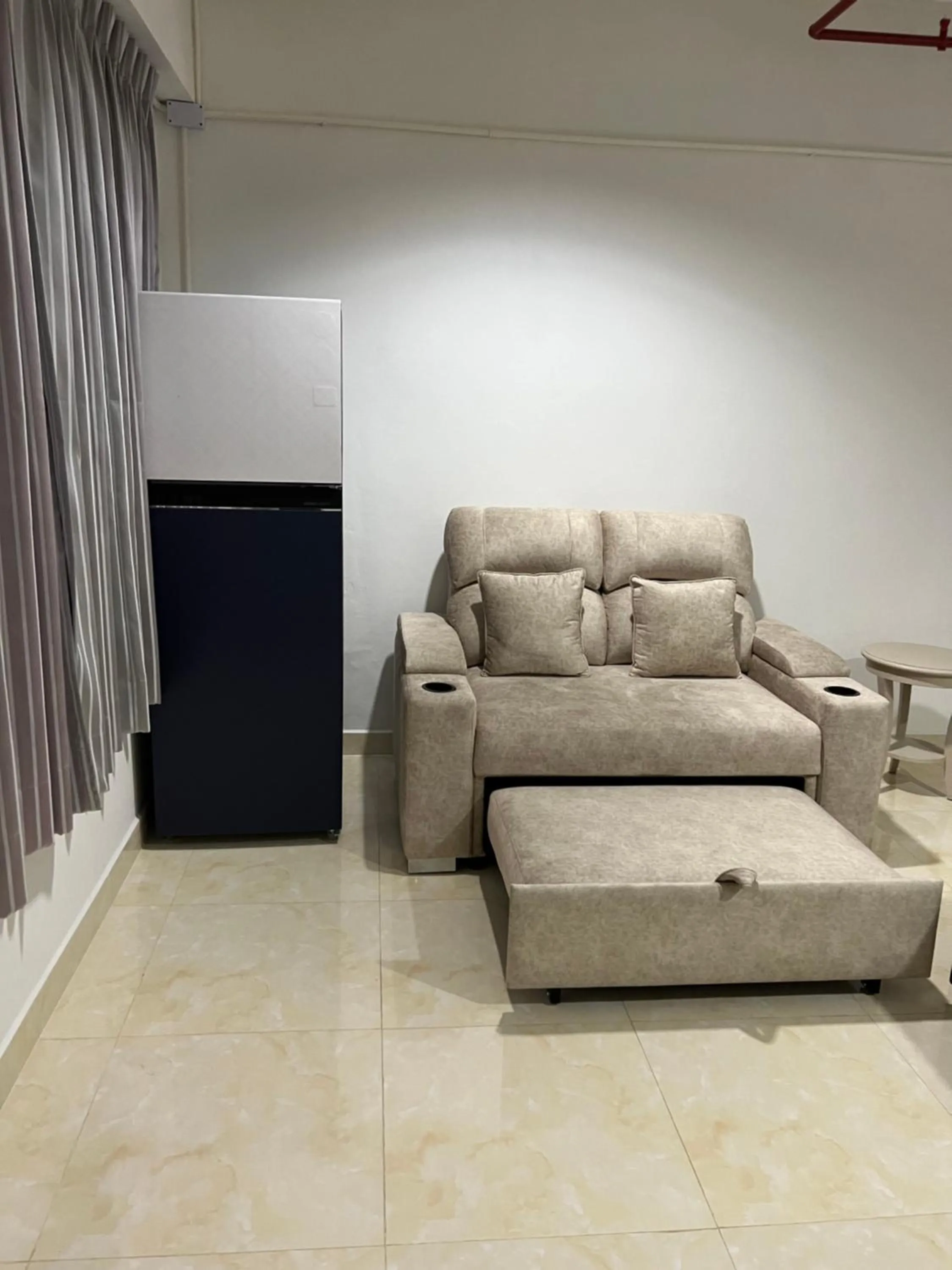 Seating area in Mall Suites Hotel