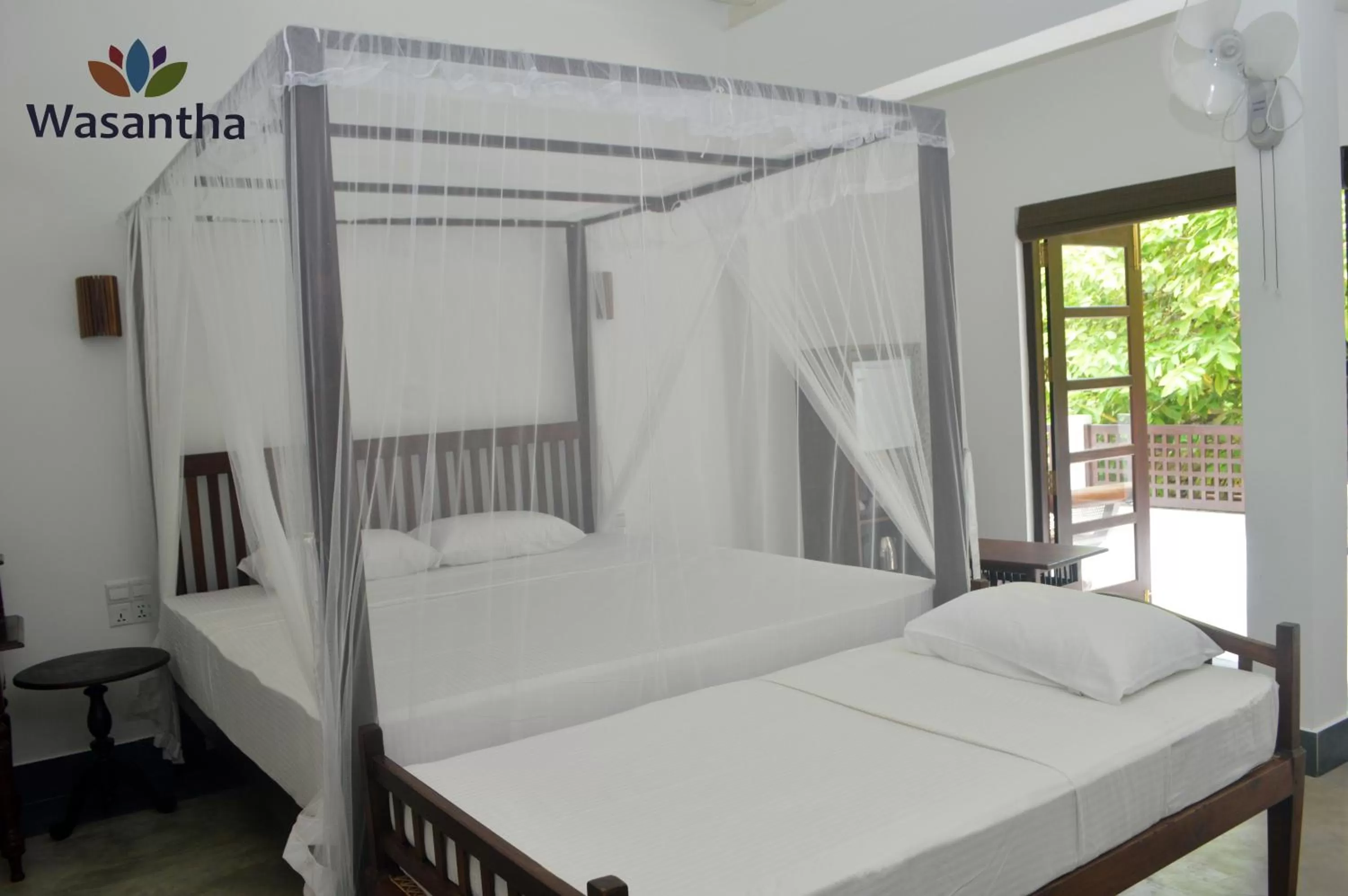 Bathroom, Bed in Wasantha Garden Hotel Restaurant & Ayurvedic Treatment