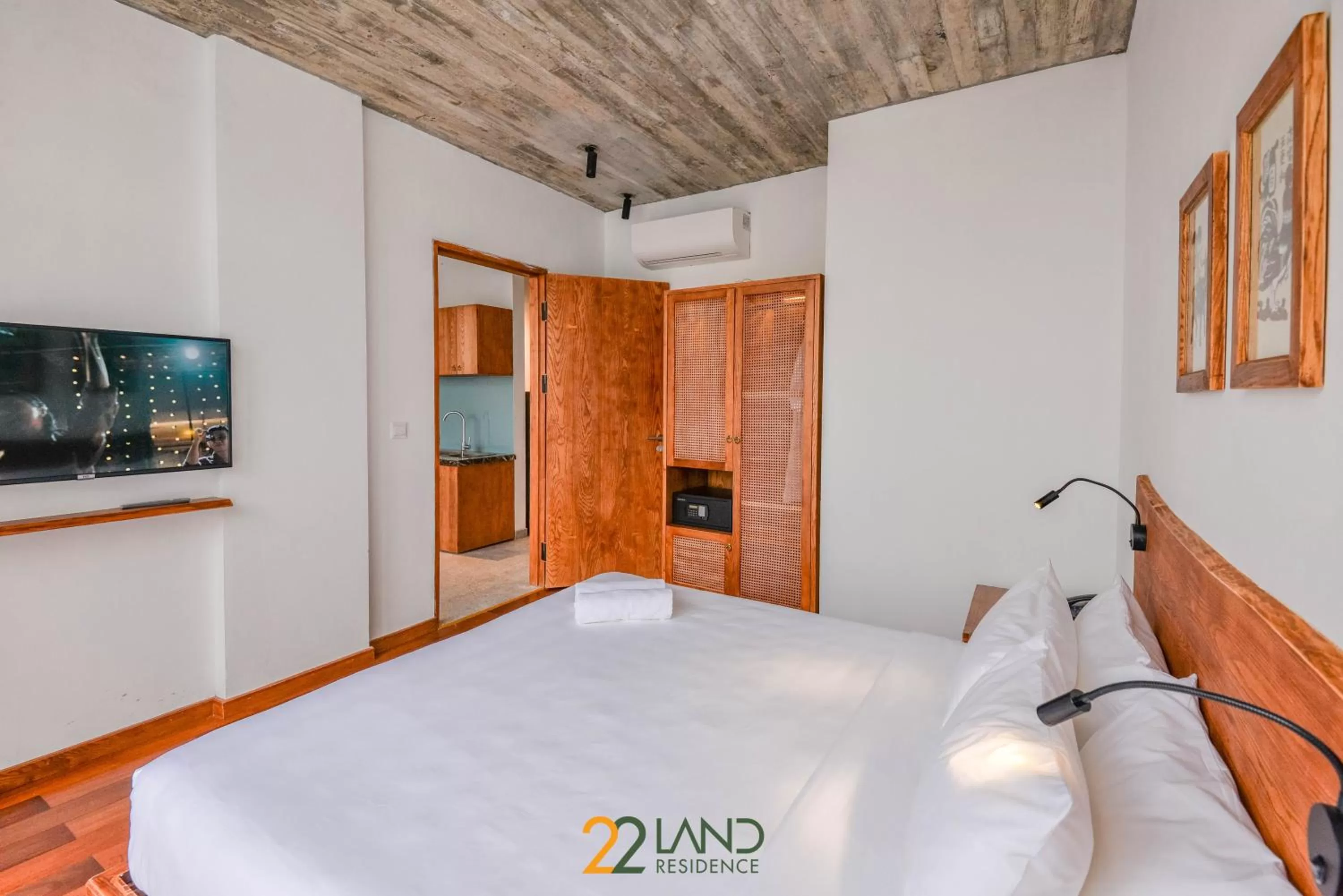 Communal lounge/ TV room, Bed in 22Land Hotel & Residence