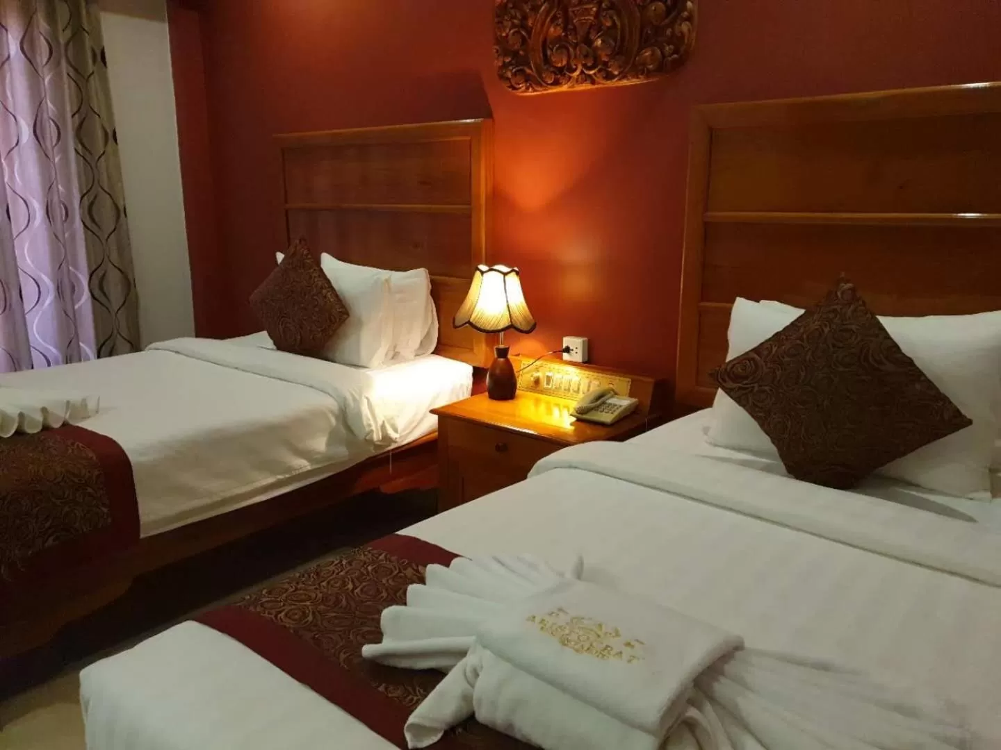 Bed in Aristocrat Residence & Hotel