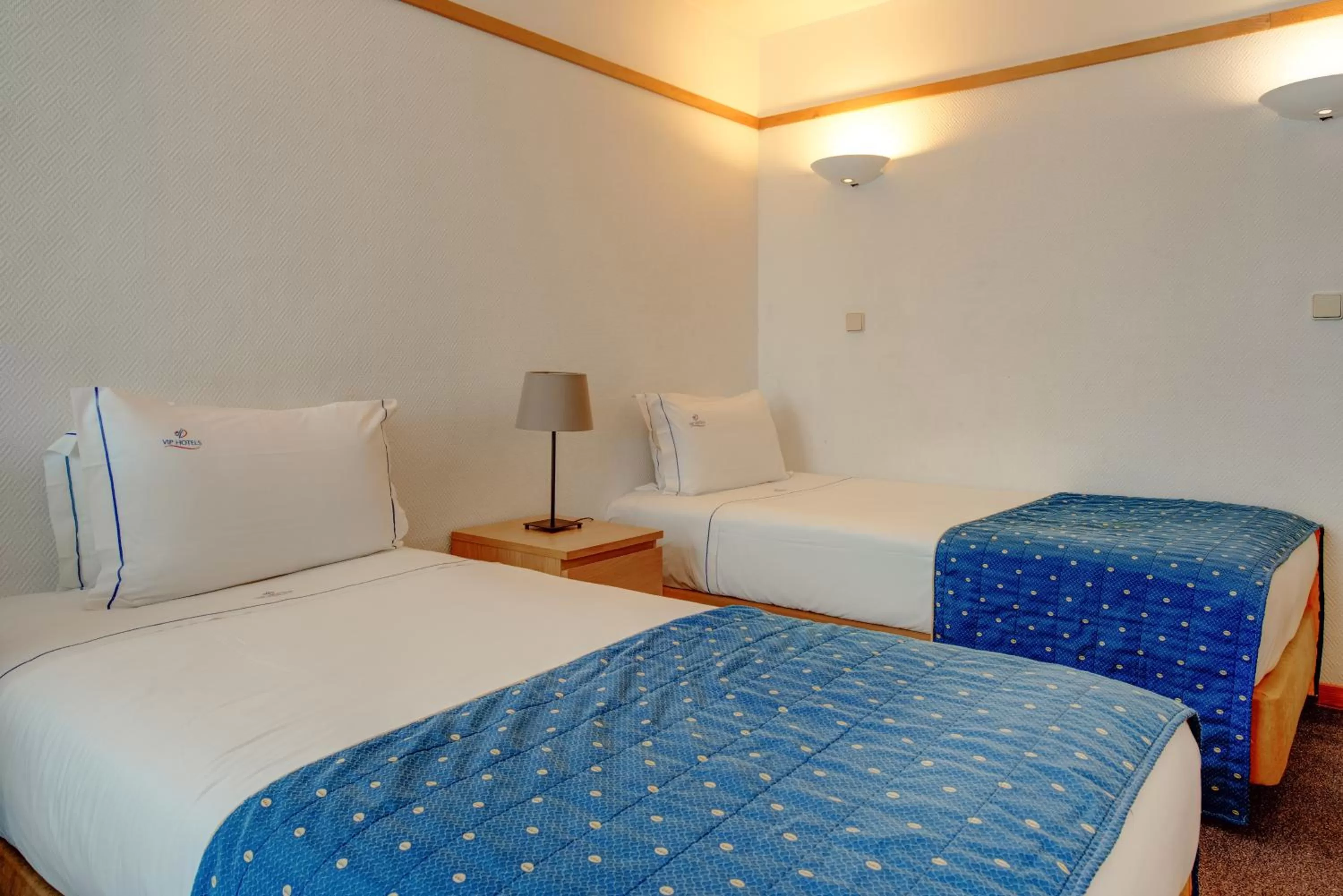 Bed in VIP Executive Eden Aparthotel