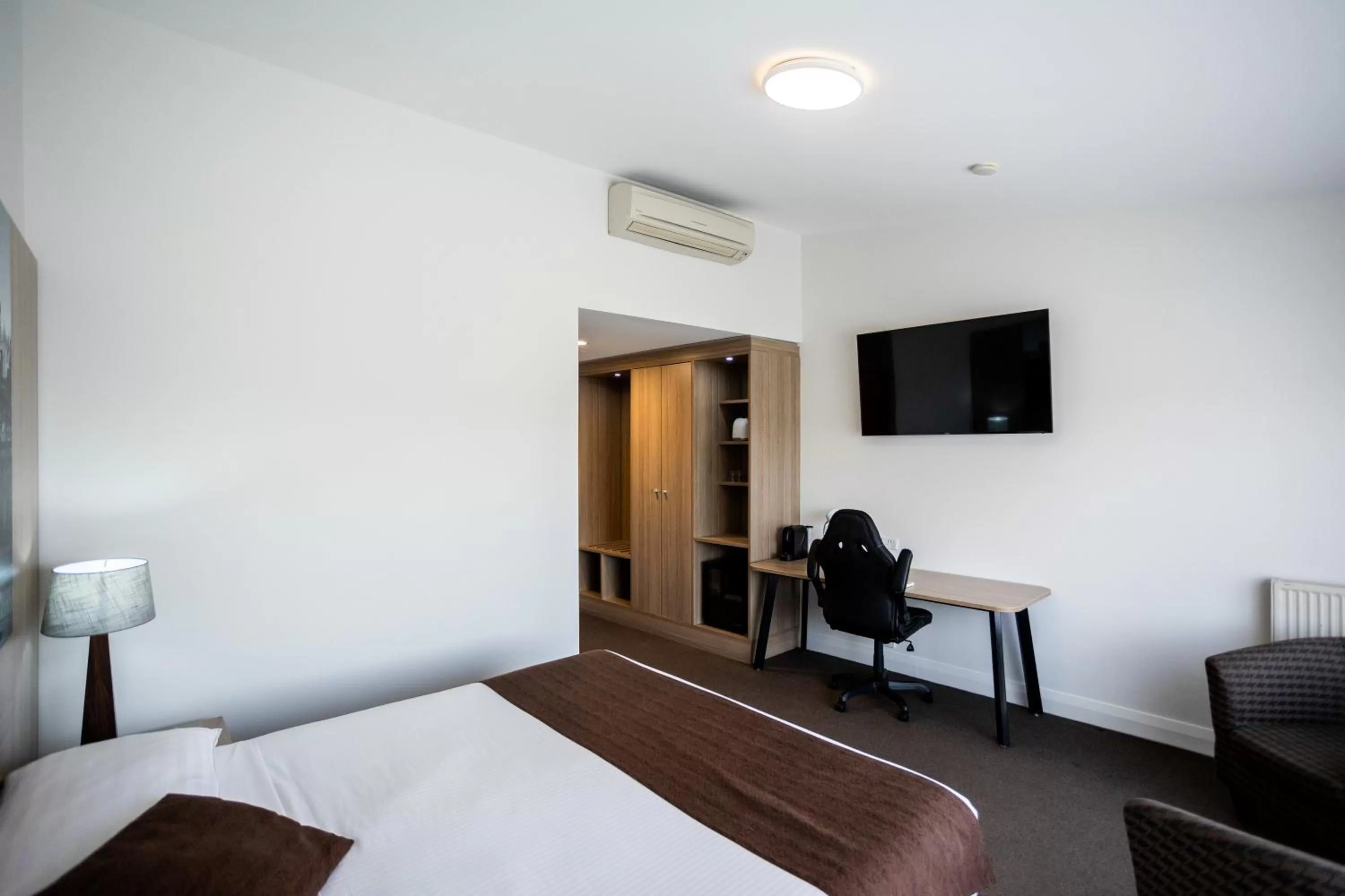 Bedroom, TV/Entertainment Center in Mantra Bathurst