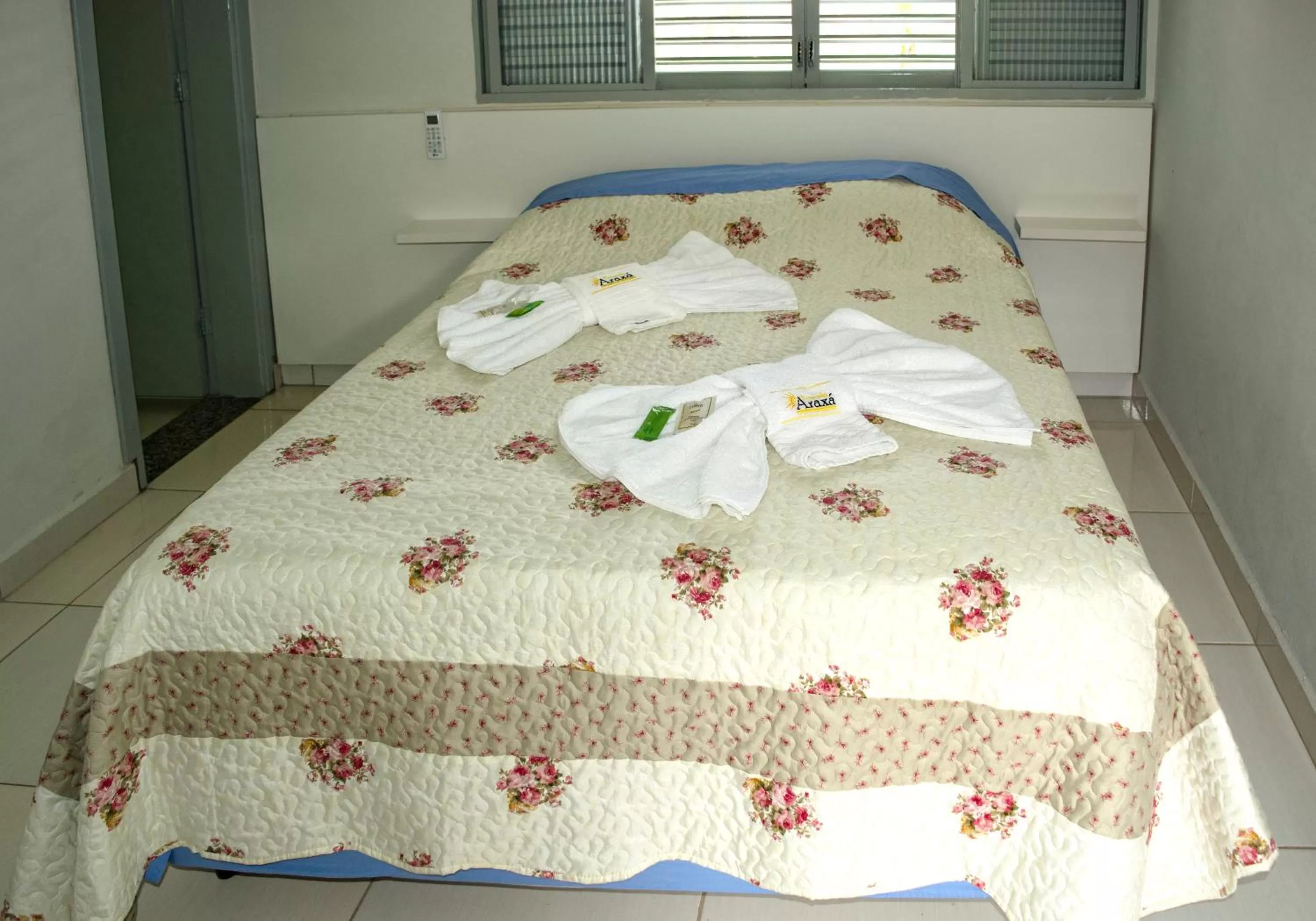 Bed in Pousada Araxá