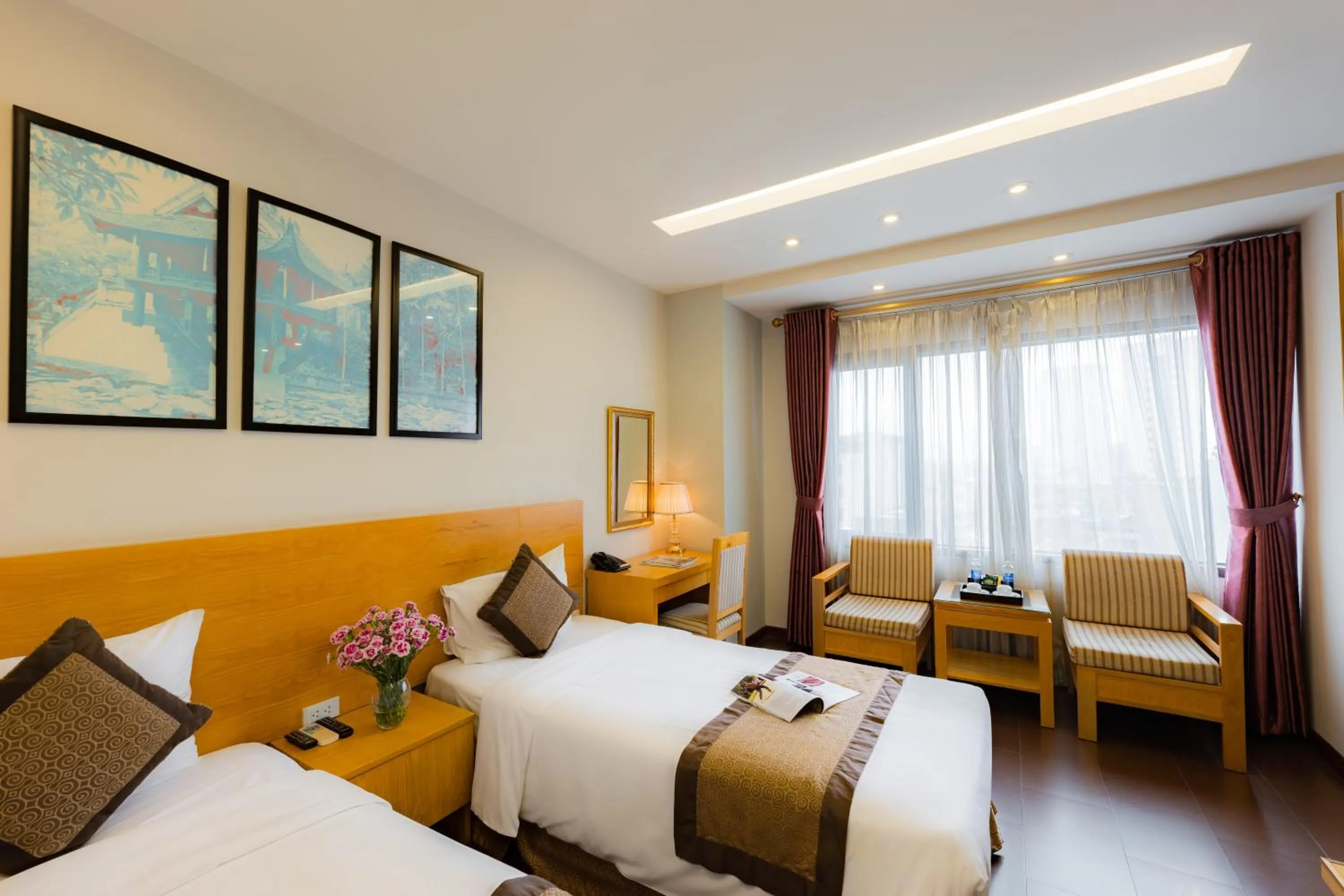 Bed in Riverside Hanoi Hotel