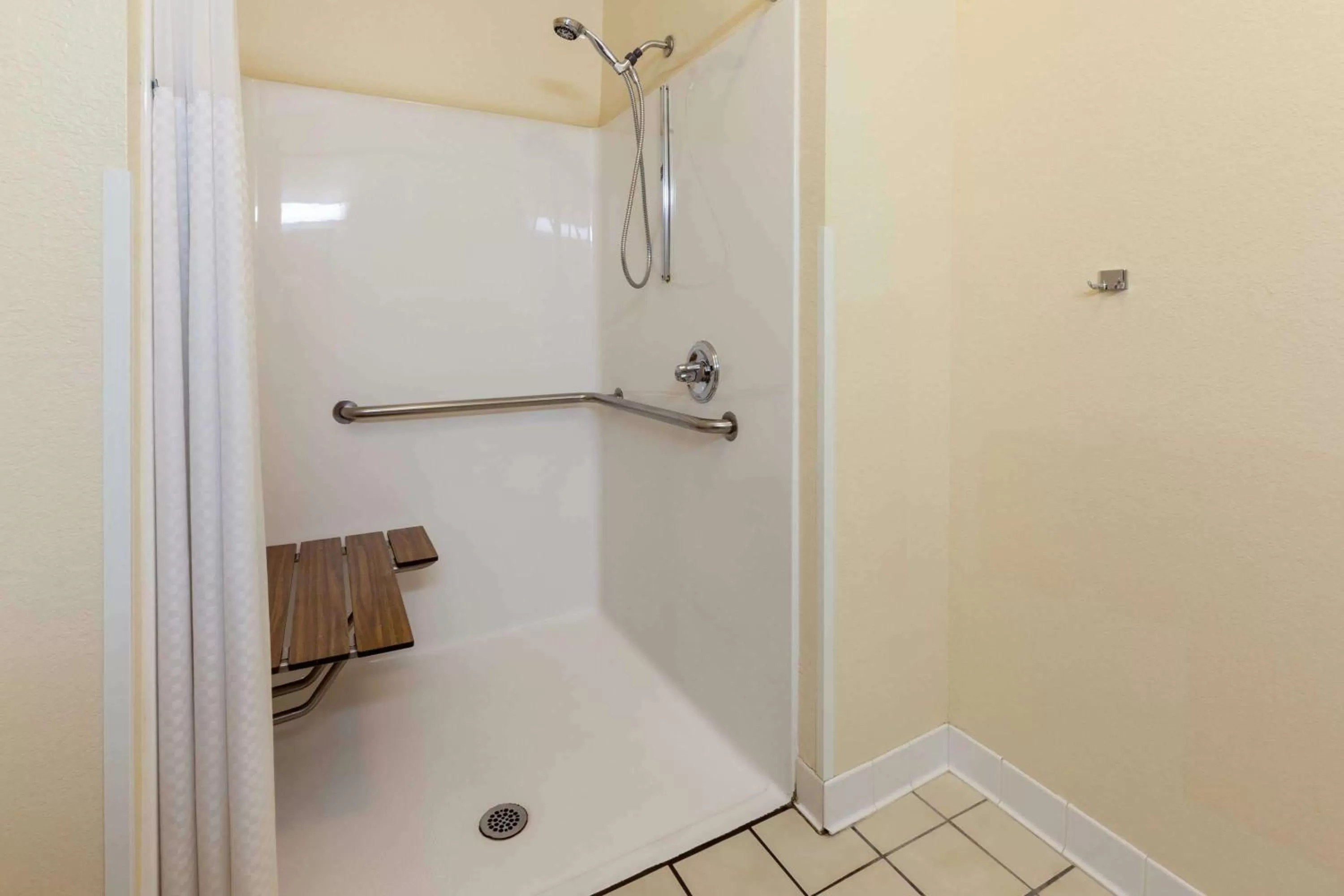 Bathroom in Super 8 by Wyndham Big Rapids