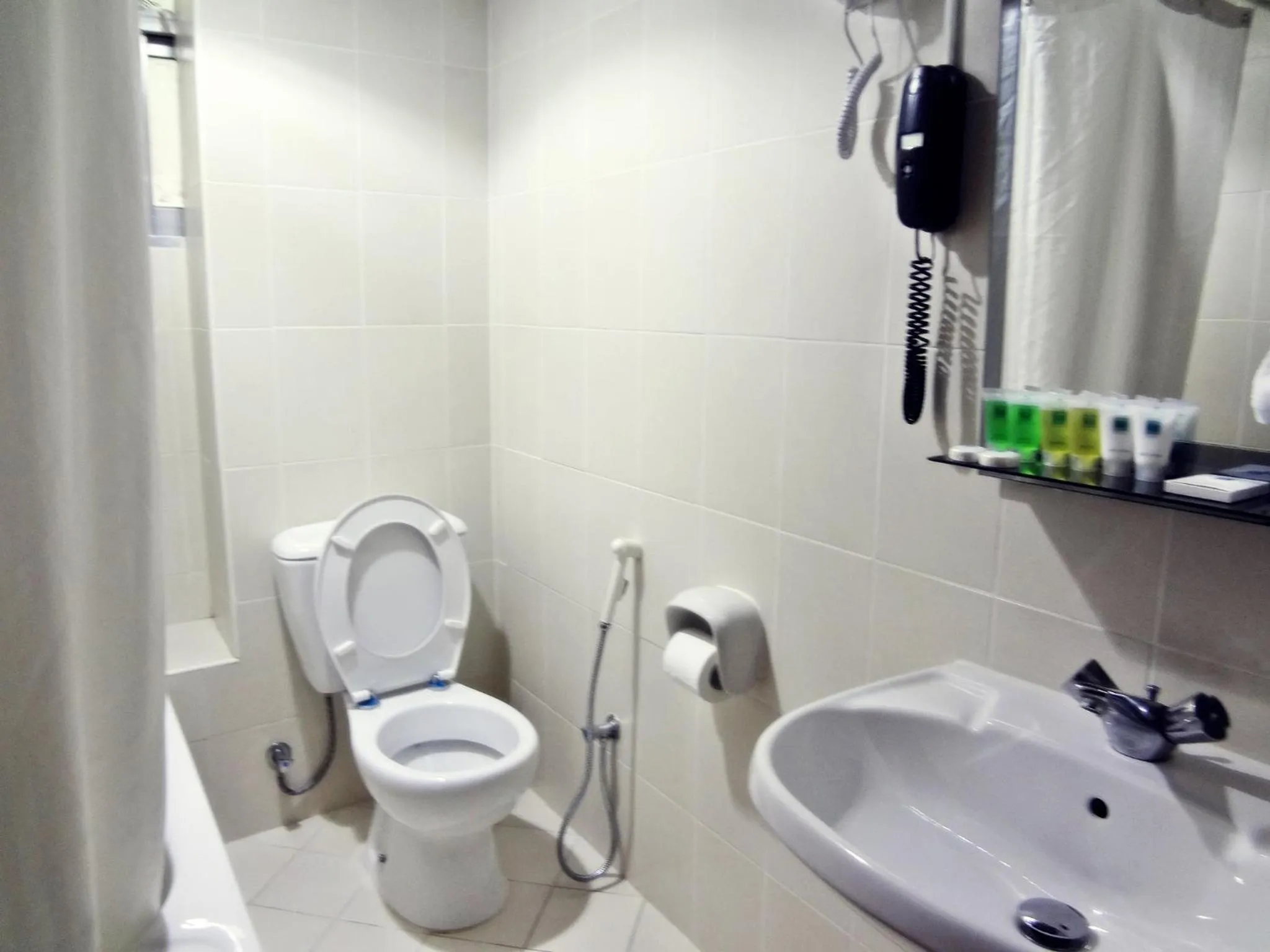 Toilet in Grand Nova Hotel