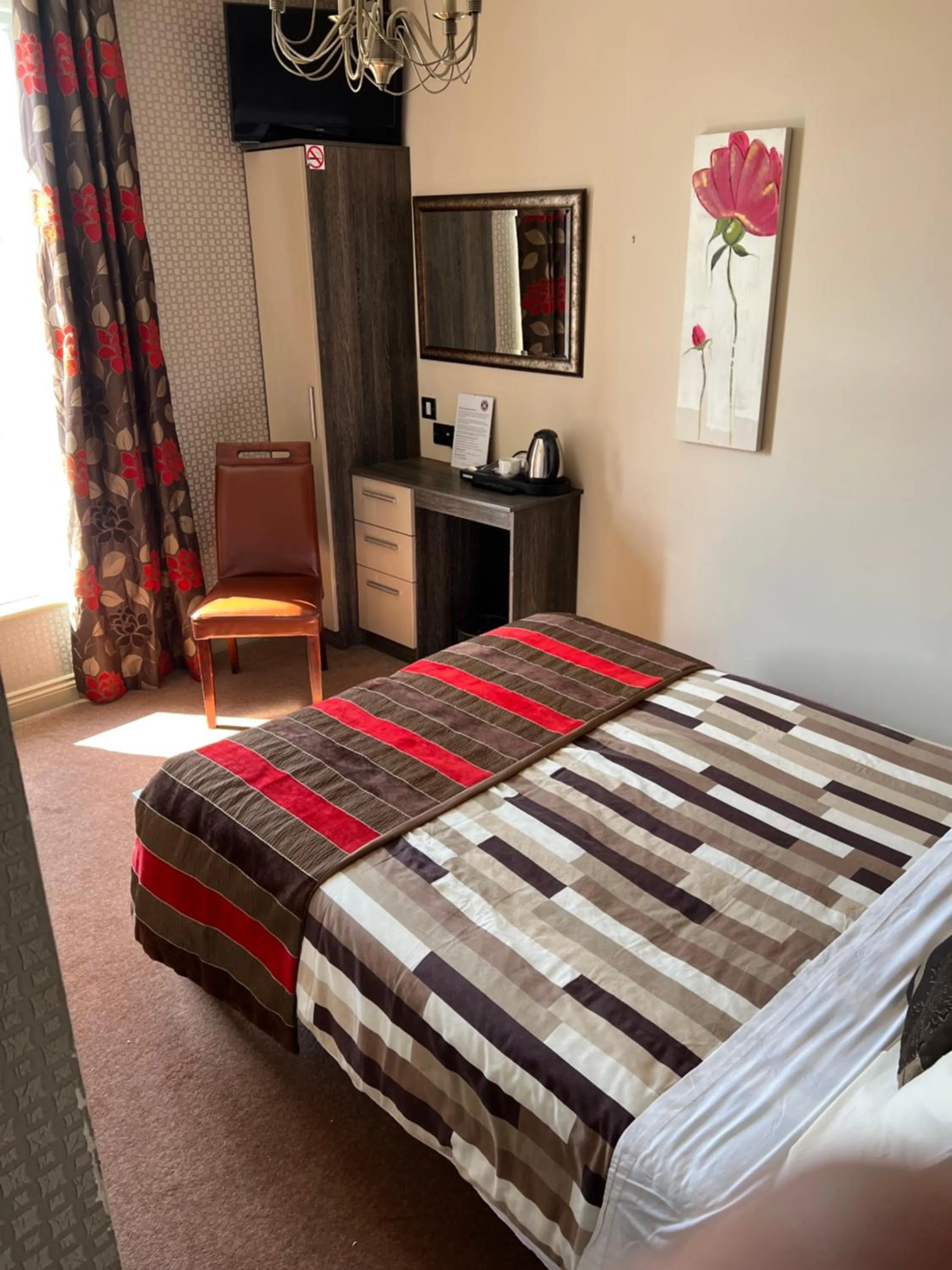 Bedroom in Southport Metro Hotel