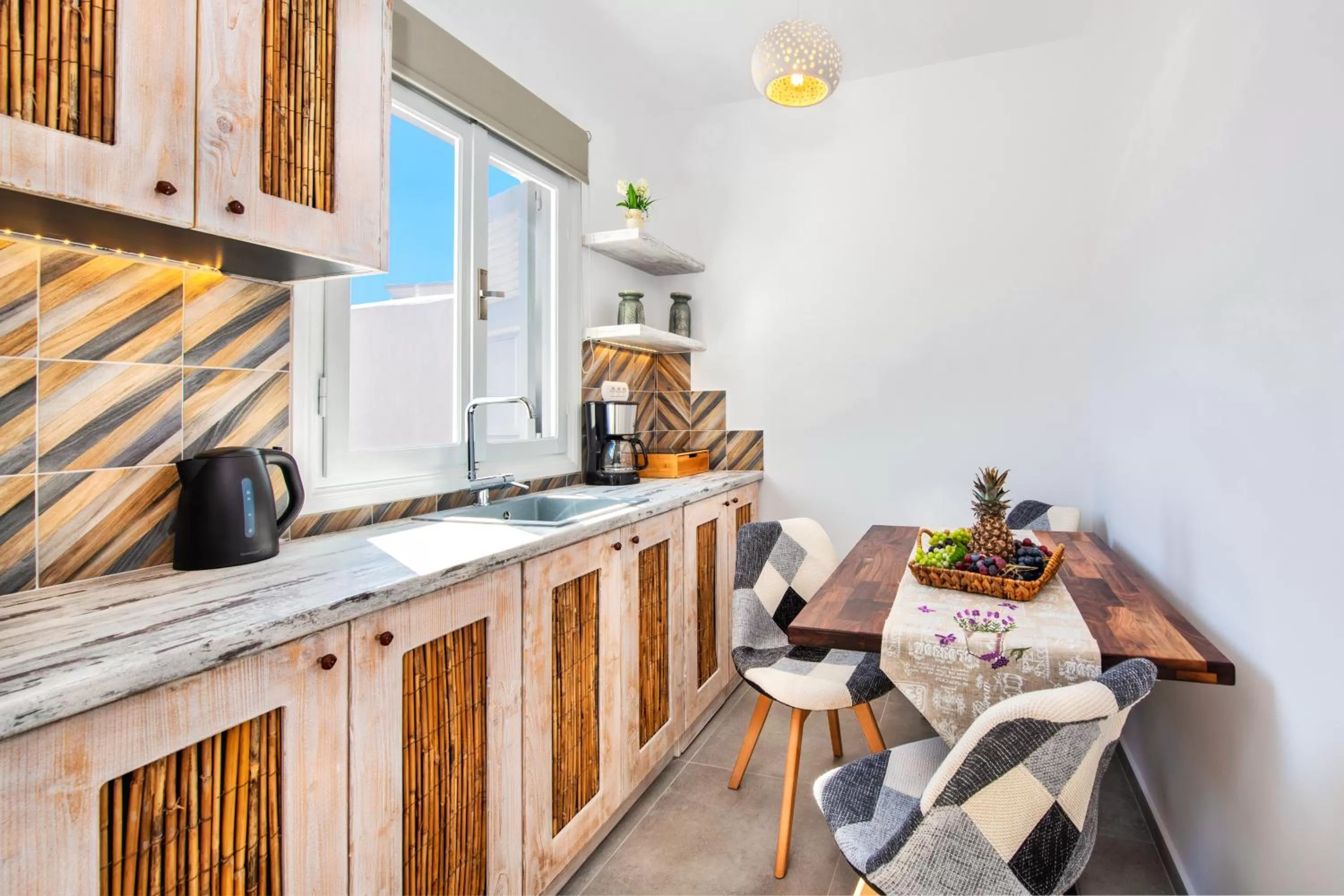 Kitchen or kitchenette in Abasa Suites