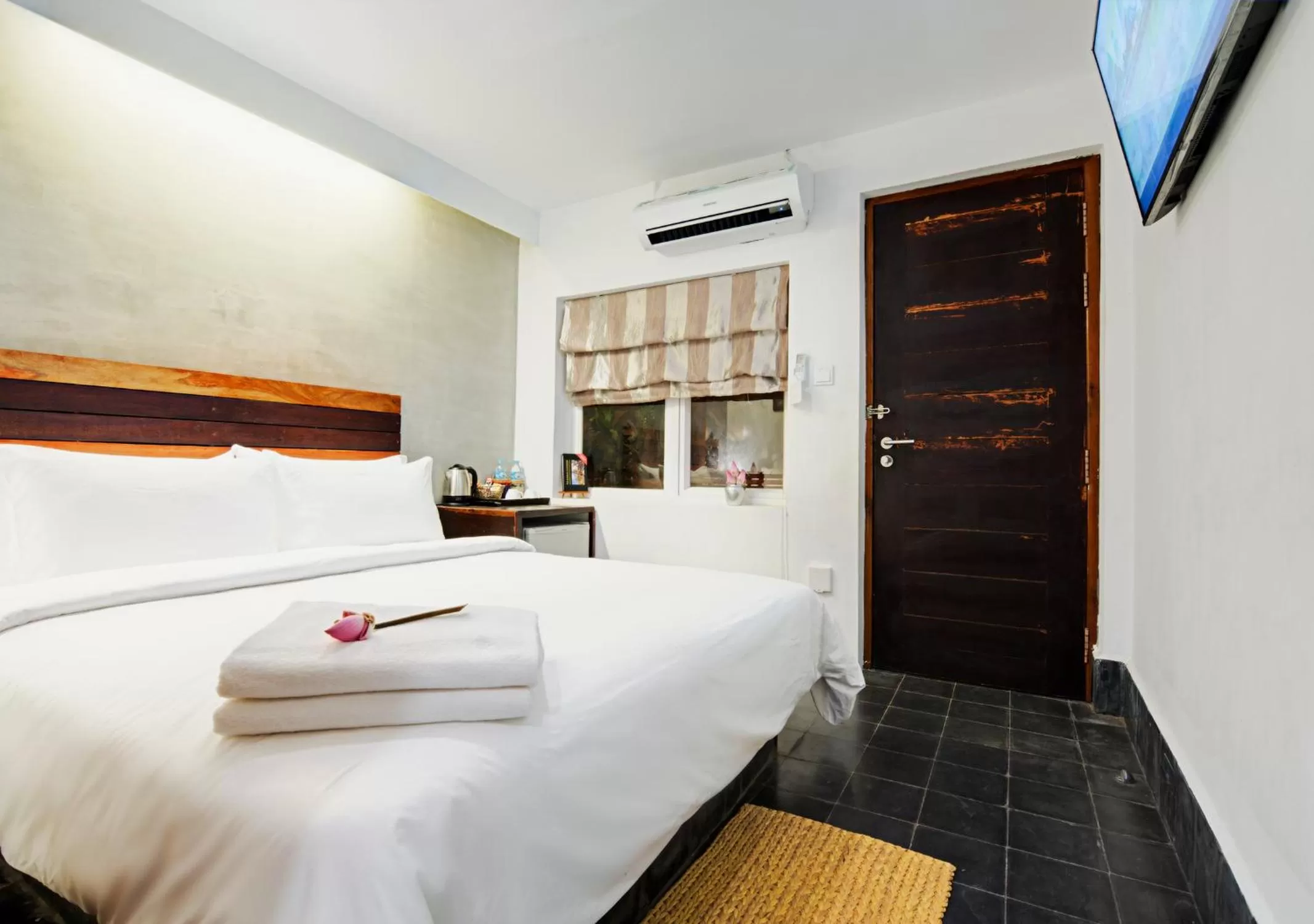 Bed in Maison Model d'Angkor