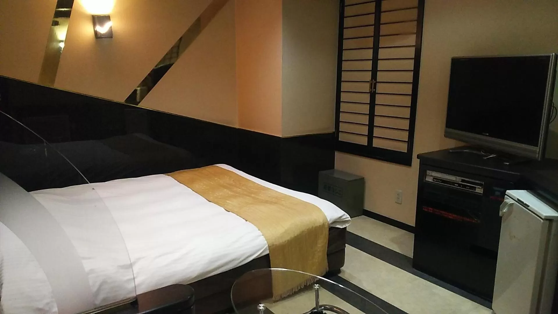 Photo of the whole room, Bed in Hotel Sting