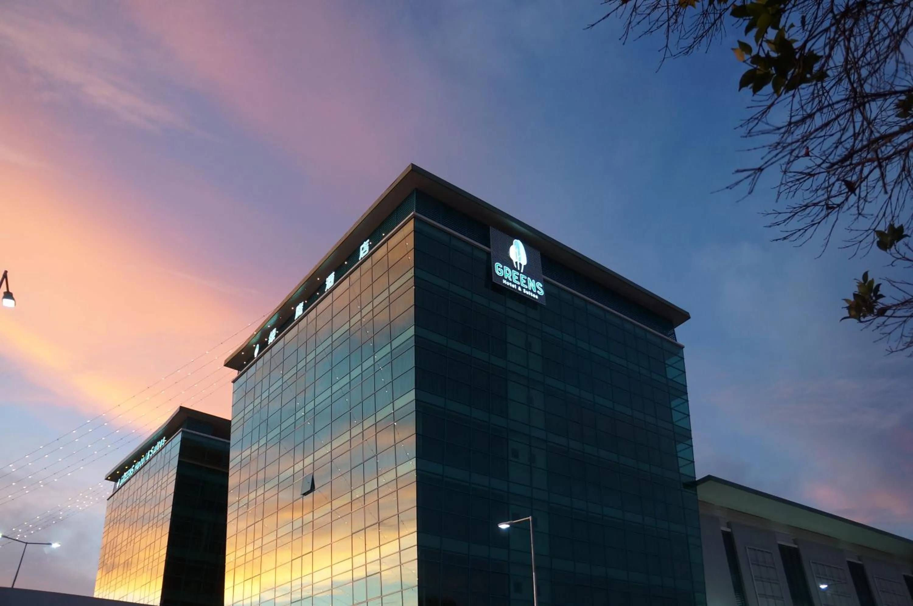 Property building in Greens Hotel & Suites