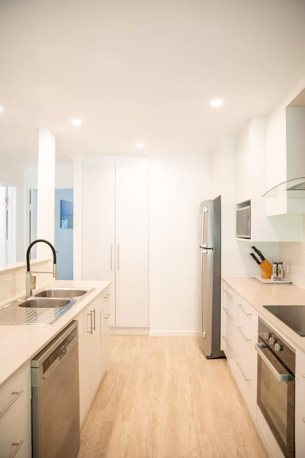 Kitchen or kitchenette in Beaches Holiday Apartments - Official Onsite Reception & Check In