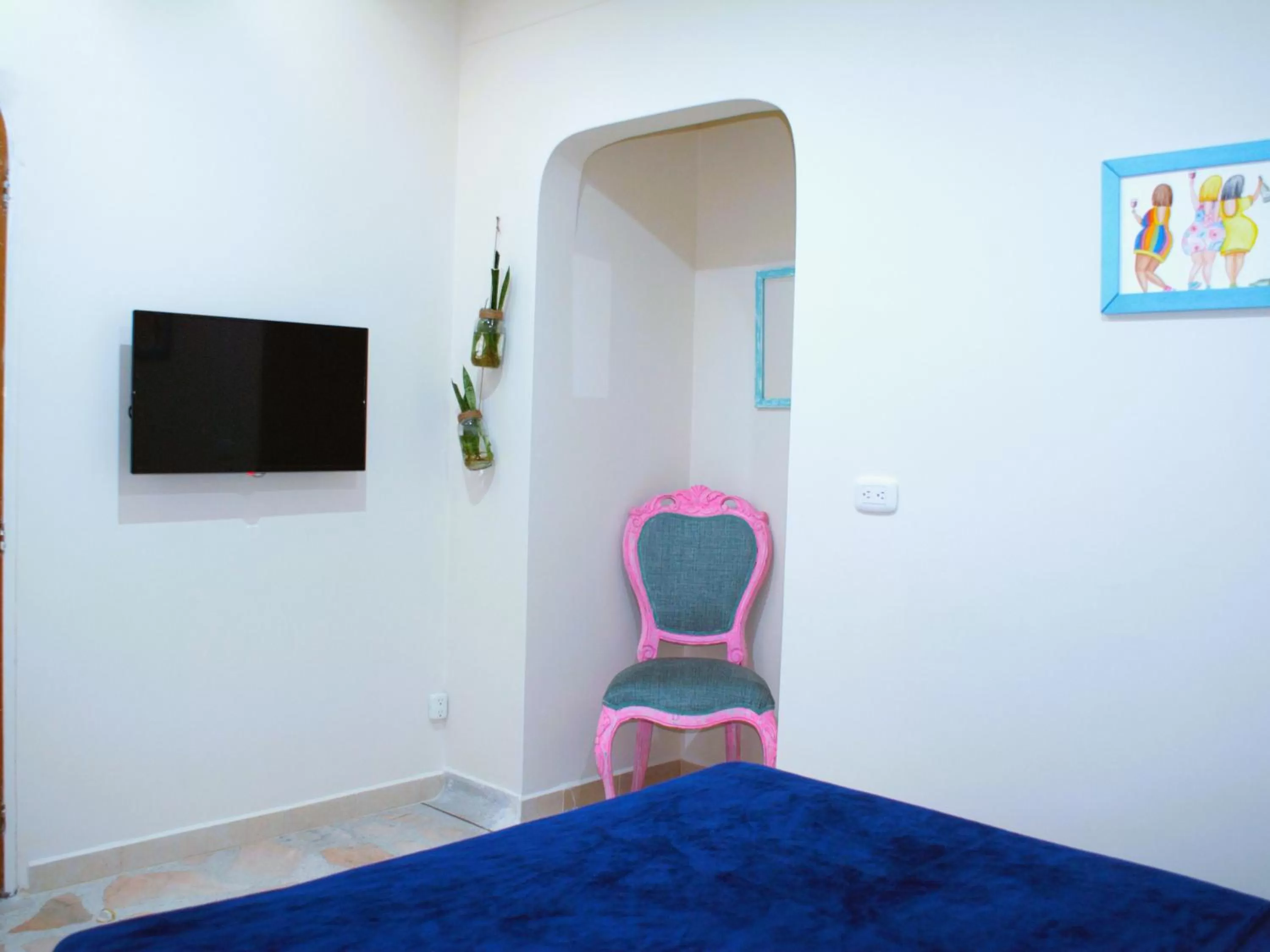 TV/Entertainment Center in Casa Azul Boutique Hostel