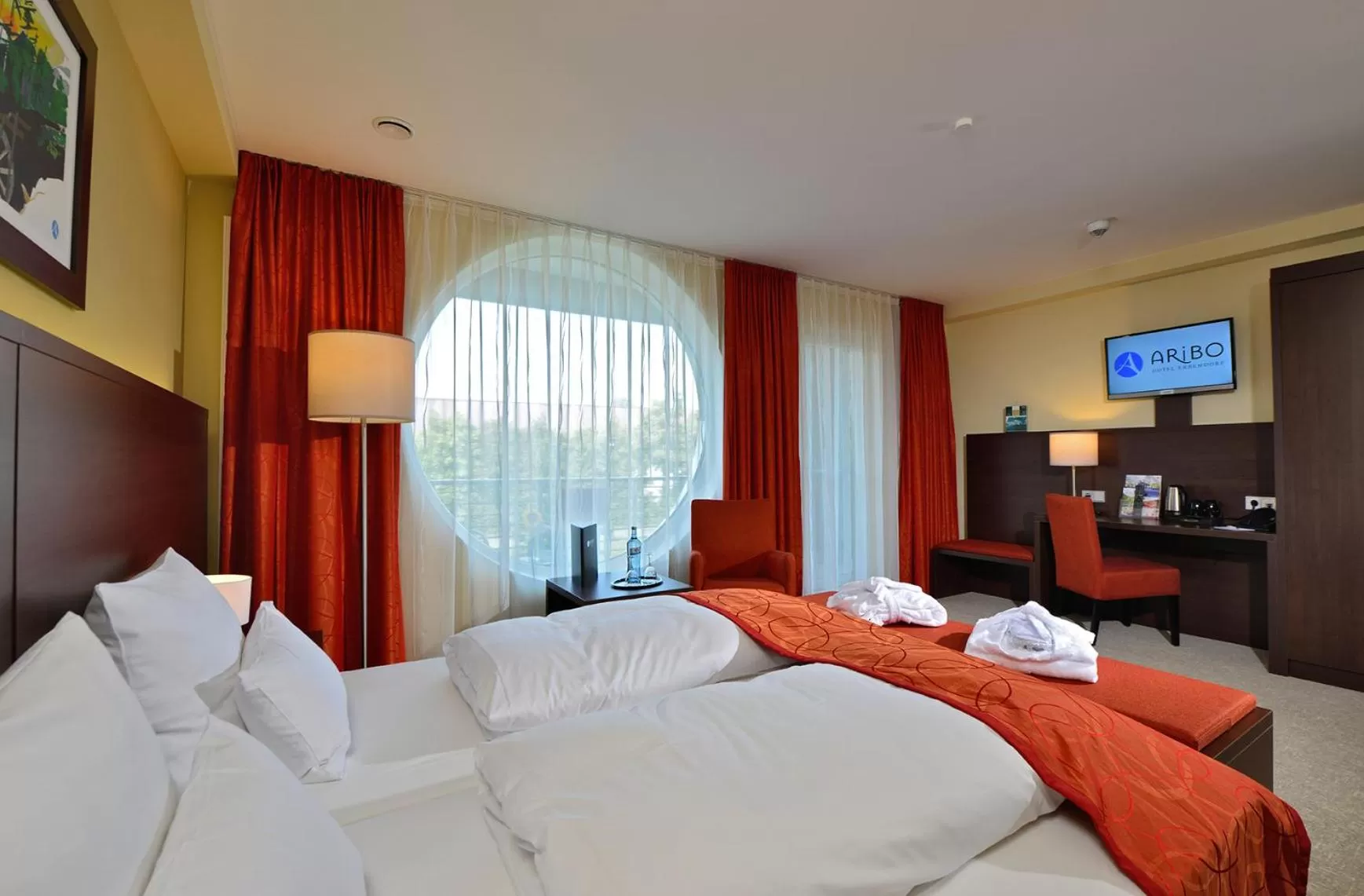 Photo of the whole room, Bed in Aribo Hotel