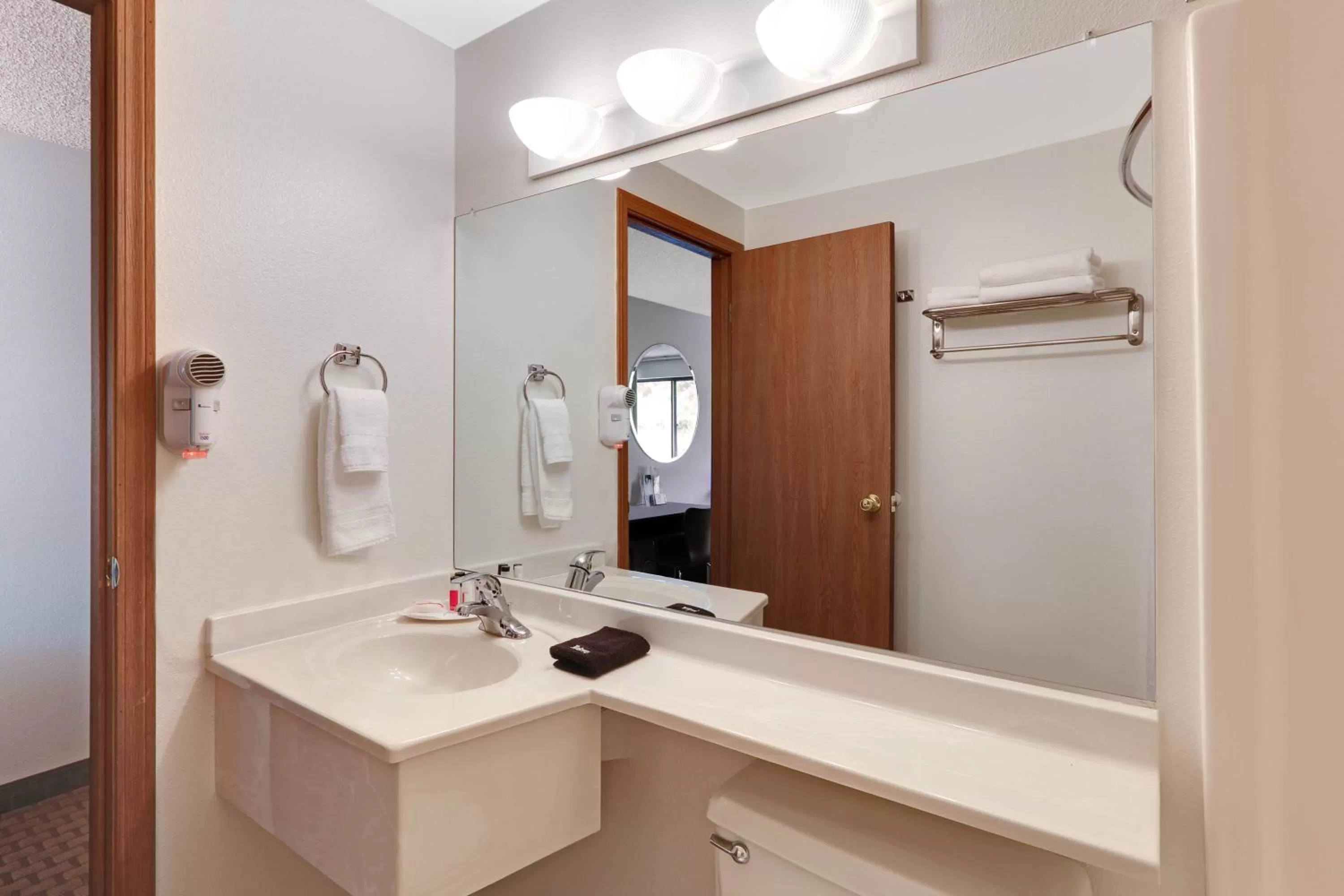 Bathroom in Super 8 by Wyndham Cody