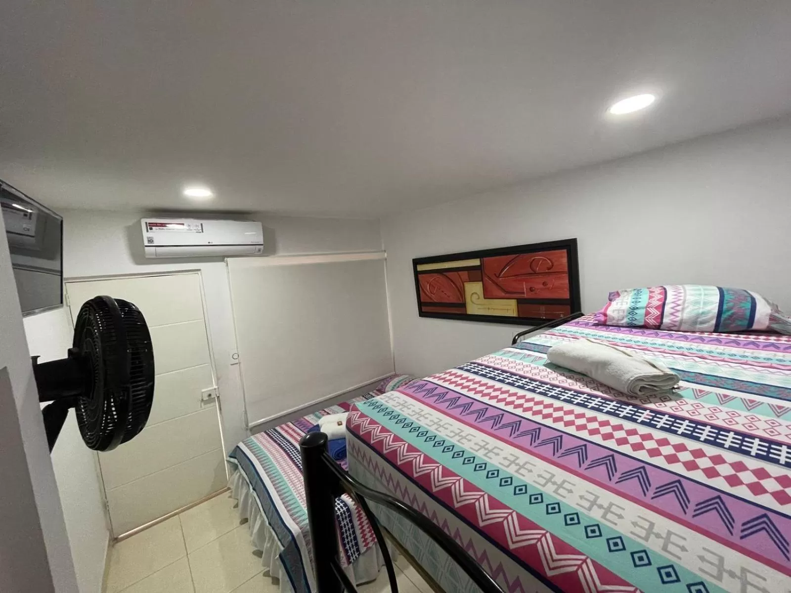 Photo of the whole room, Bed in Lindos apartaestudios y habitaciones en Ibague