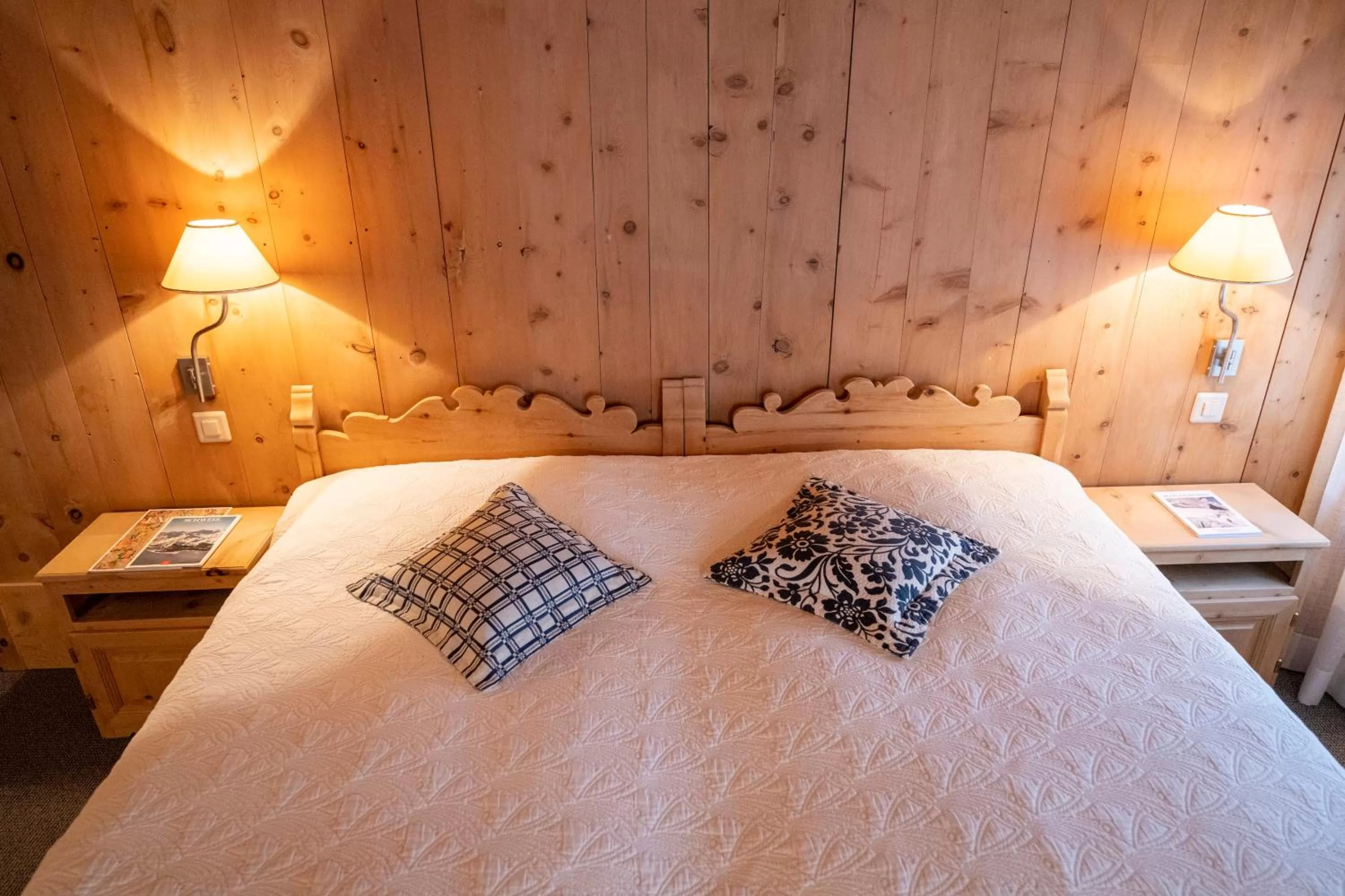 Bed in Hotel Engiadina