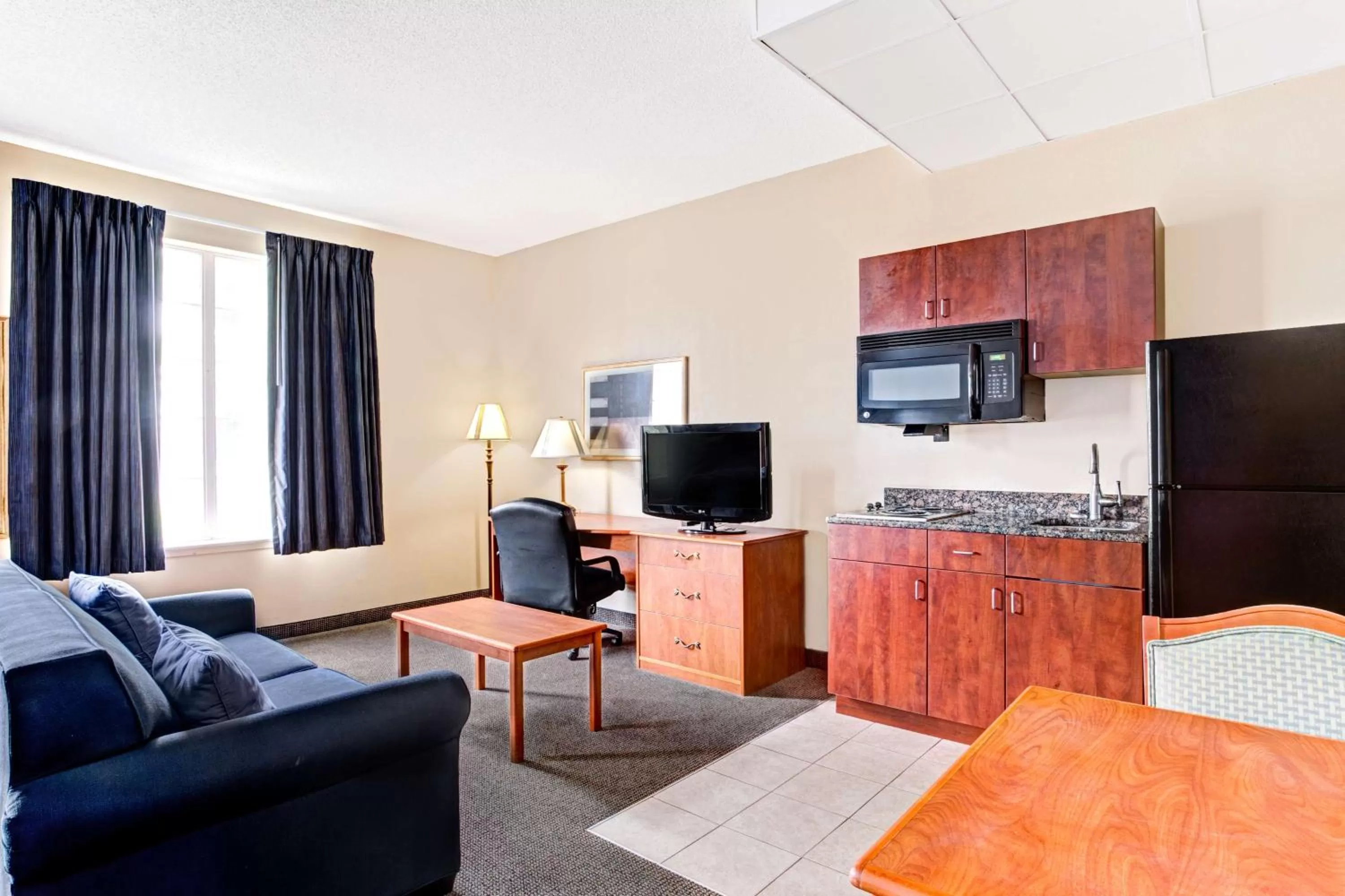 Double Studio with Two Double Beds- Smoking in Super 8 by Wyndham Smithfield-Selma