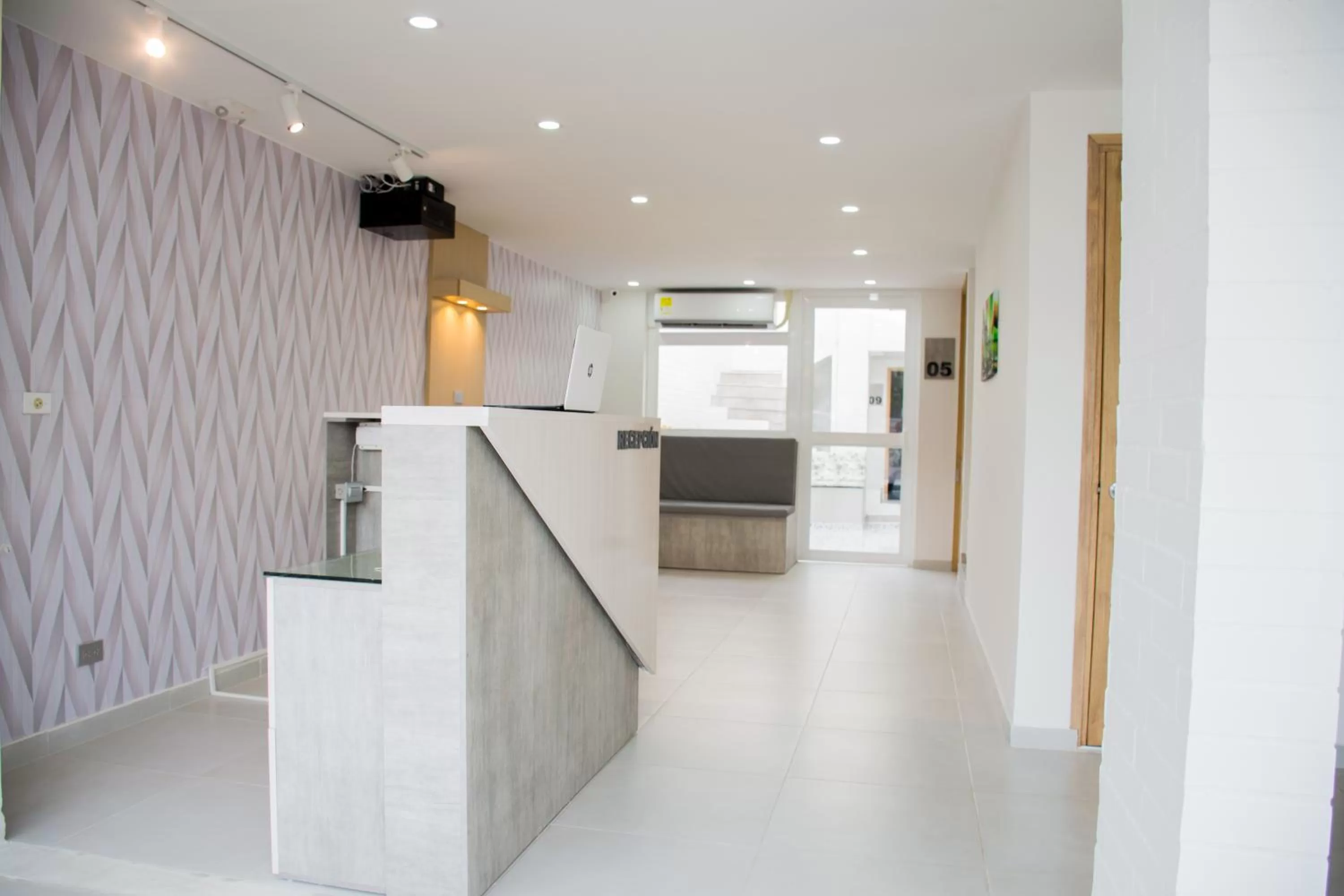 Lobby or reception, Kitchen/Kitchenette in Stanza Hotel Monteria