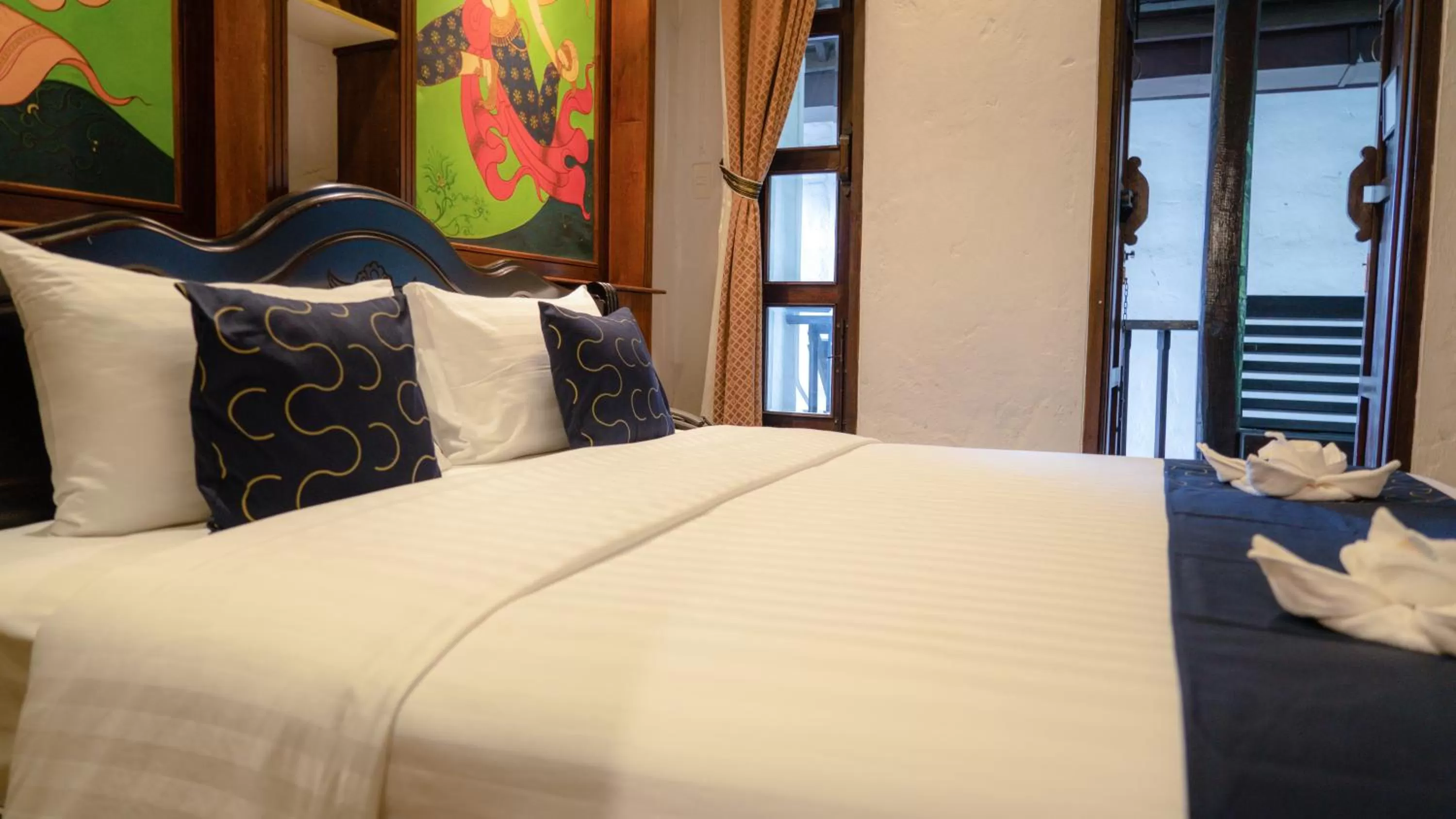 Bed in Cheva Gallery Boutique Hotel