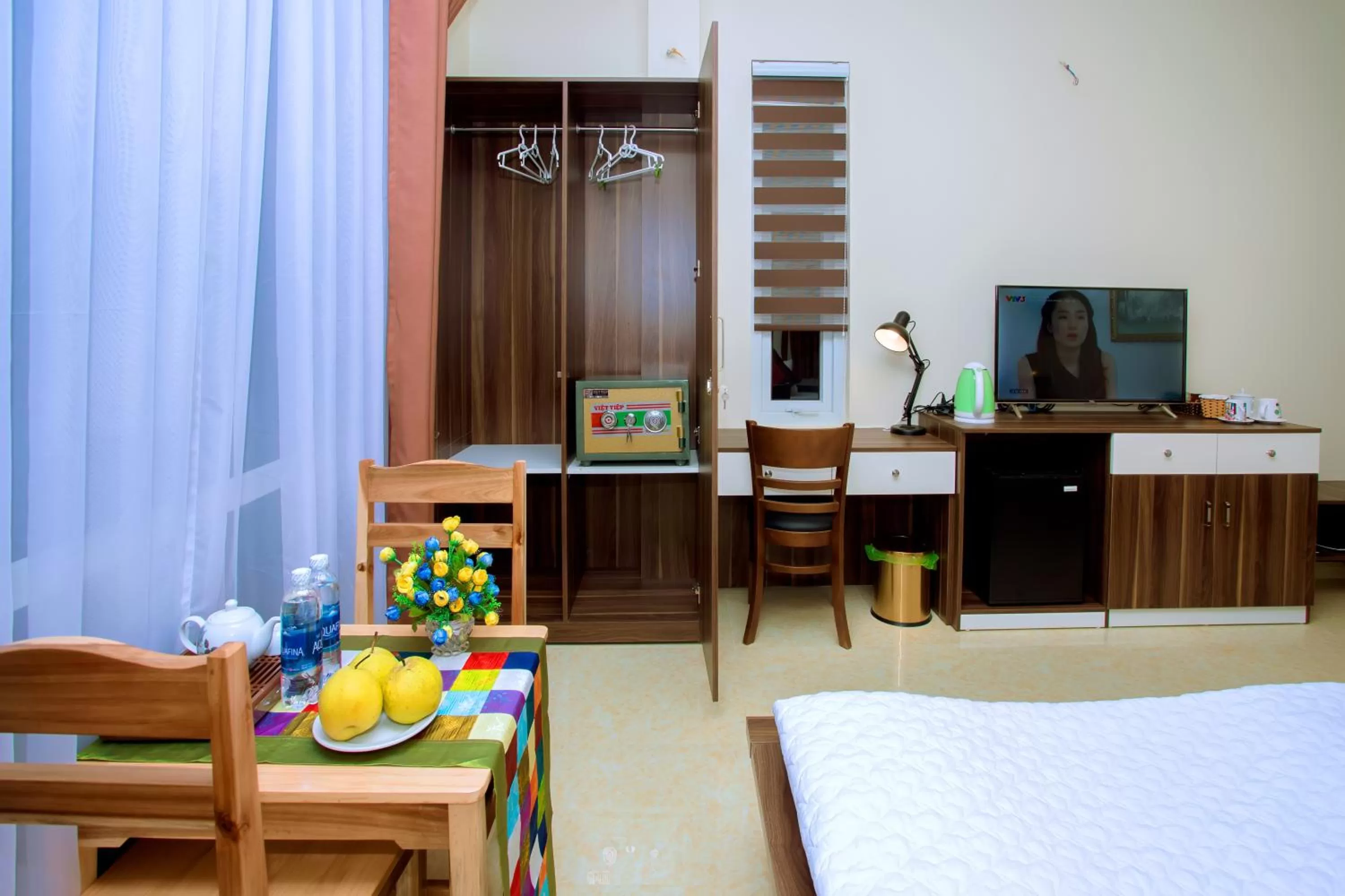 Bed in Friendly Home Hotel