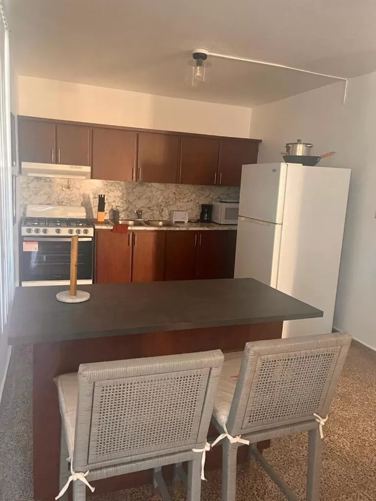 Kitchen/Kitchenette in El Flamingo Beach Club