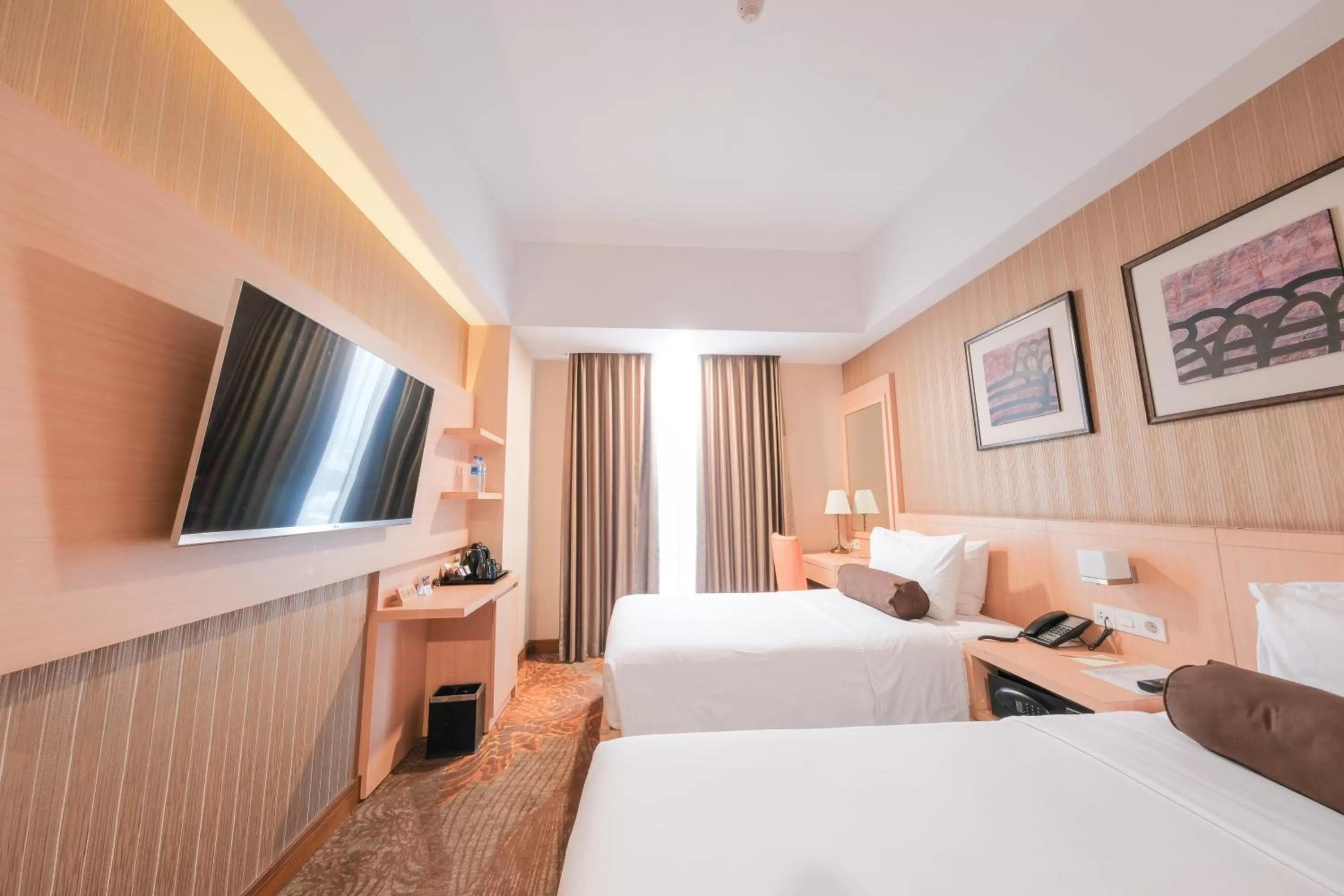 Bed in Hotel Chanti Managed by TENTREM Hotel Management Indonesia