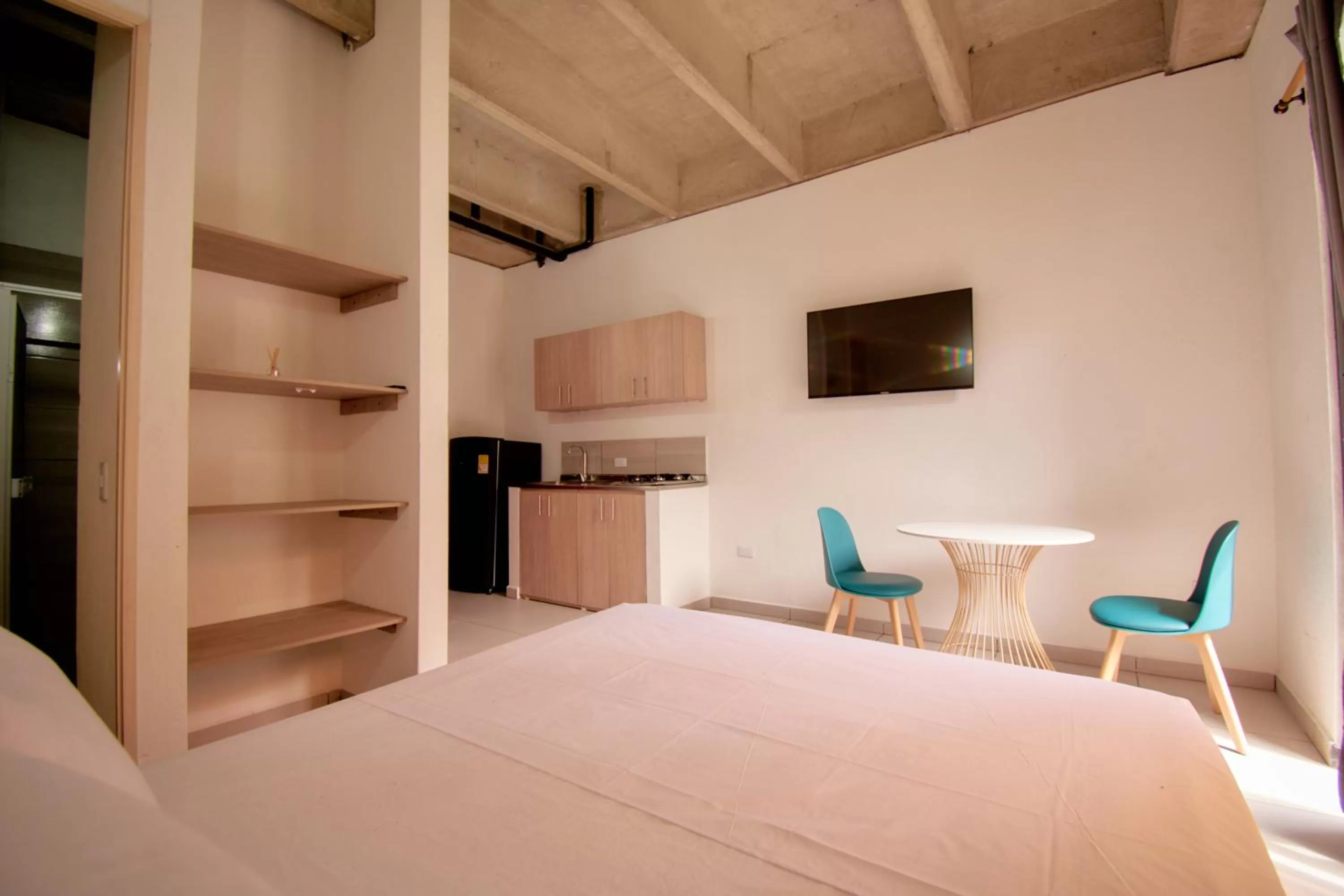 Dining area, Bed in Mangata Living by Bernalo Hotels