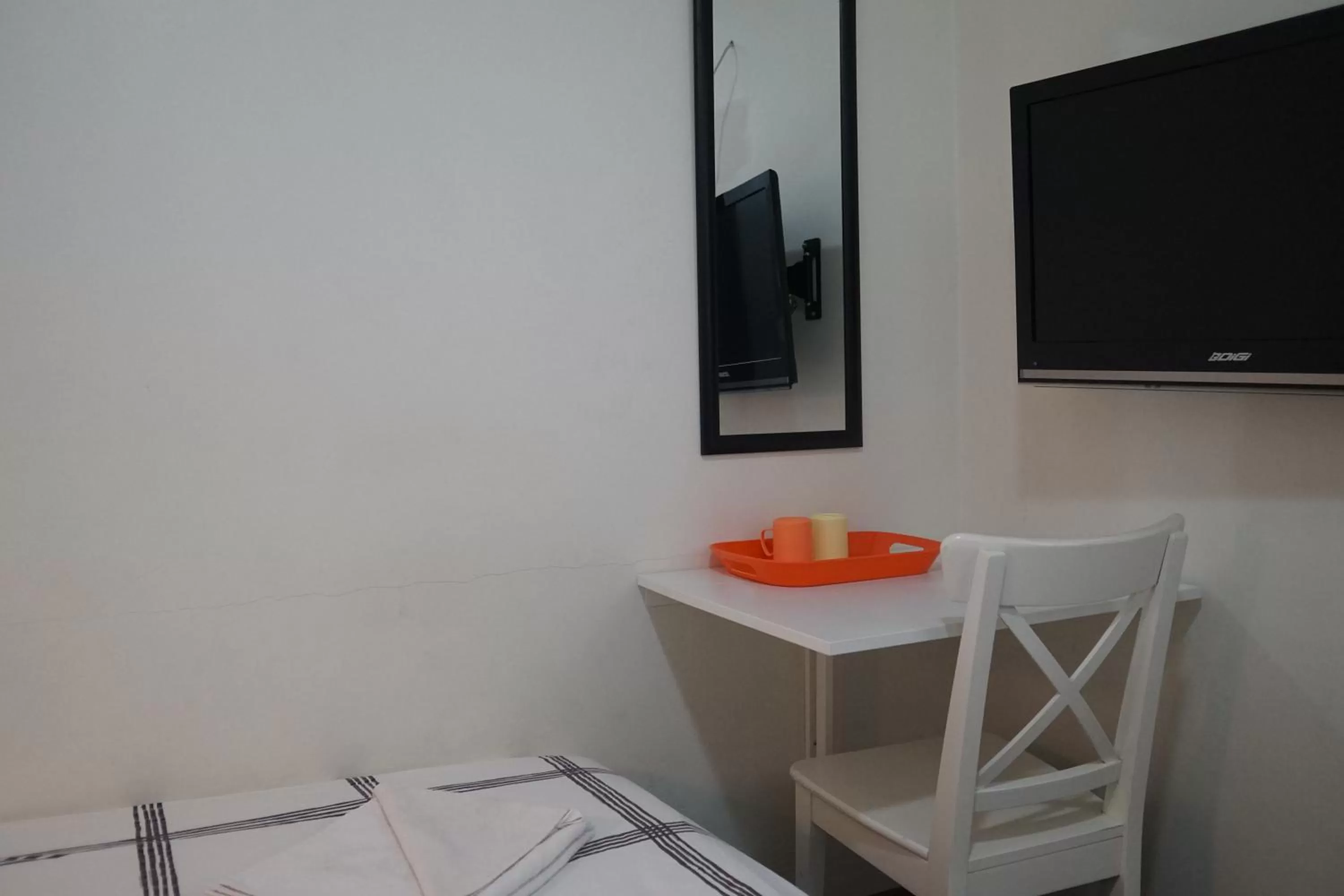 Photo of the whole room, TV/Entertainment Center in Holland Lodge Paramaribo