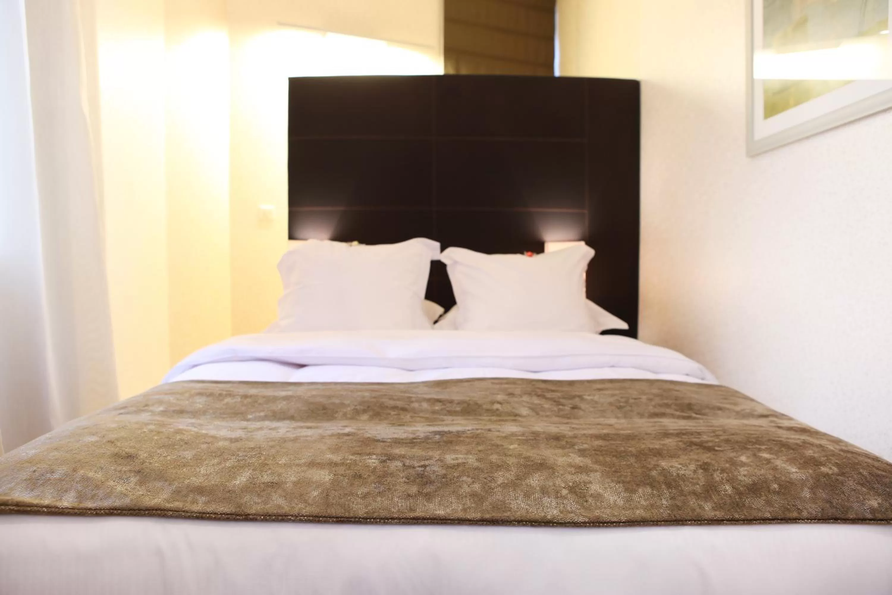 Bed in Logis Hôtel Ettenheim