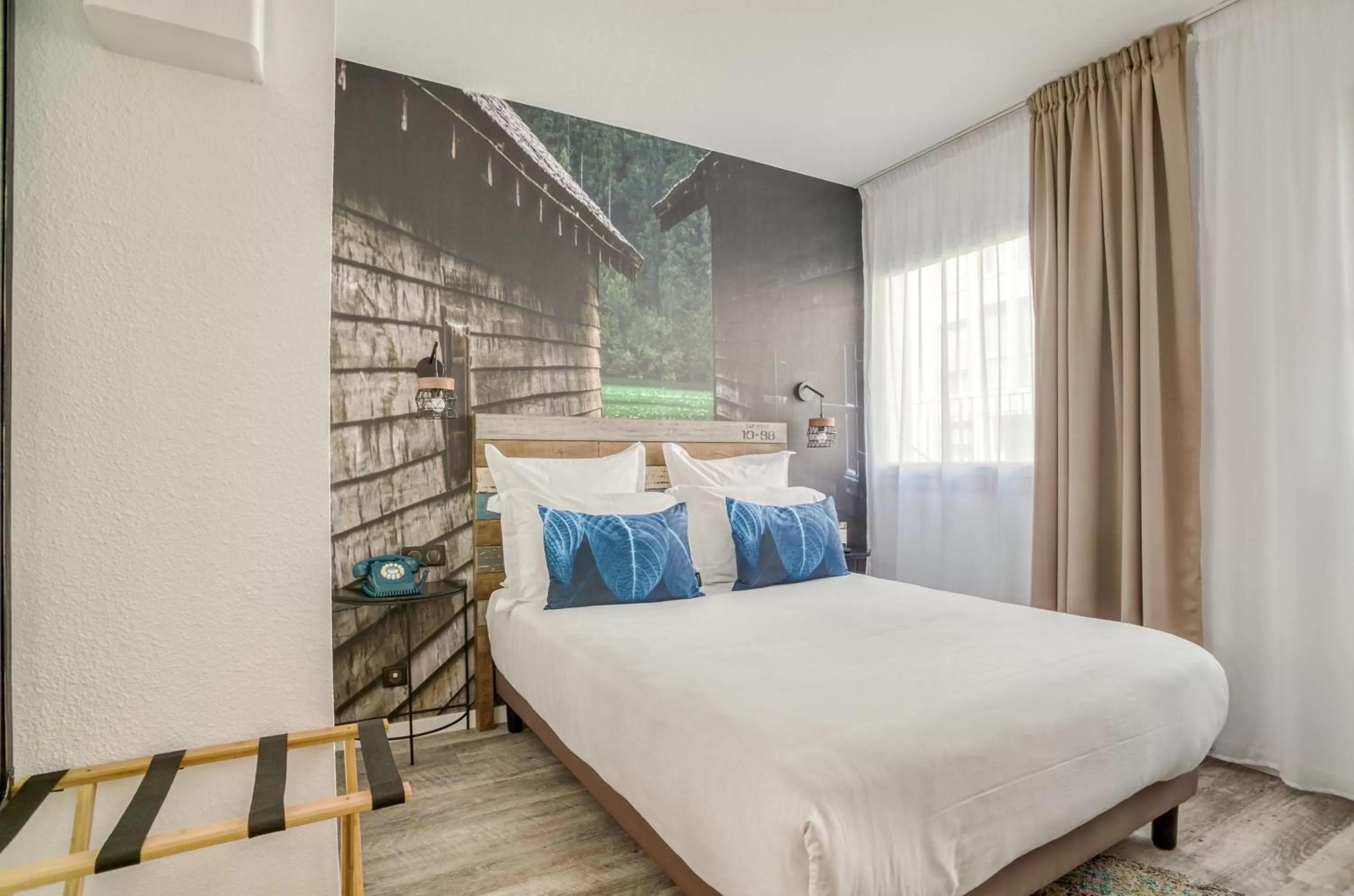 Bedroom in La Maison Hôtel Mulhouse Centre