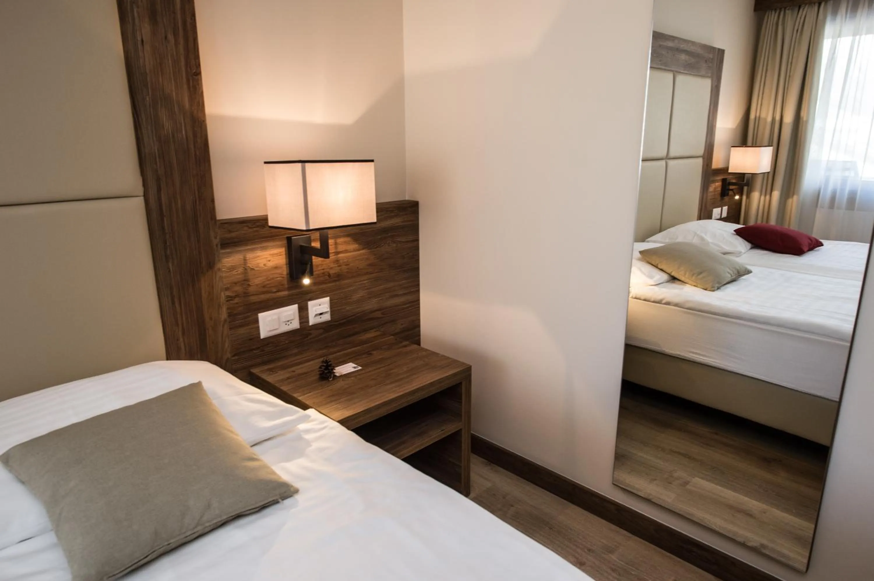 Bedroom, Bed in Hotel Ambassador Zermatt