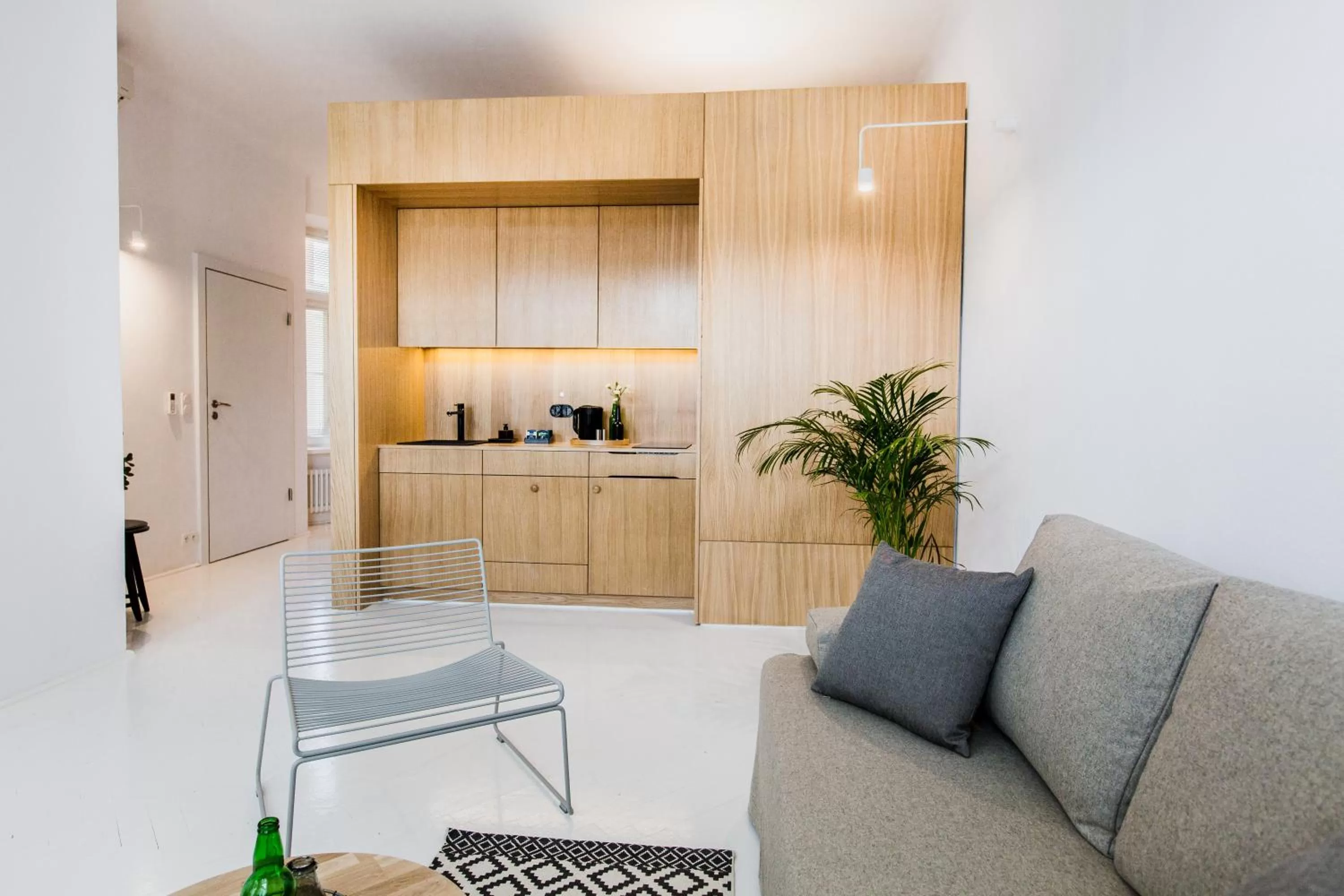 Kitchen or kitchenette, Seating Area in Apartamenty Browar Perła - Perła Brewery Apartments