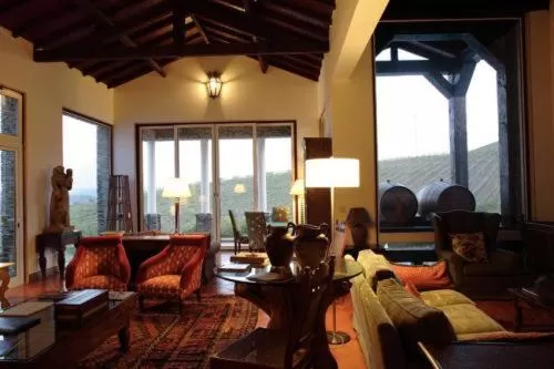 Communal lounge/ TV room in Casa das Pipas / Quinta do Portal