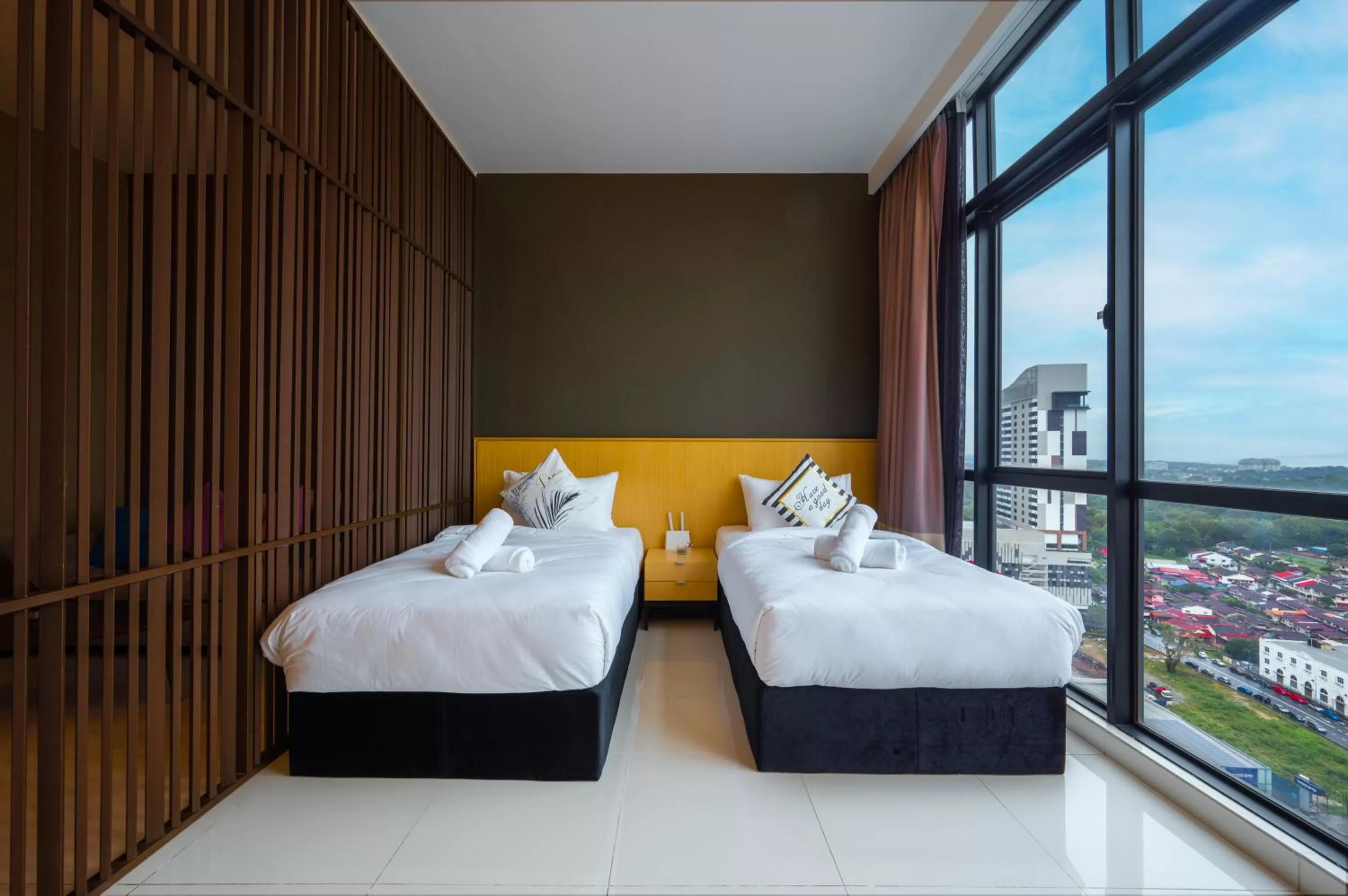 Bed in Greystone 99 Suites