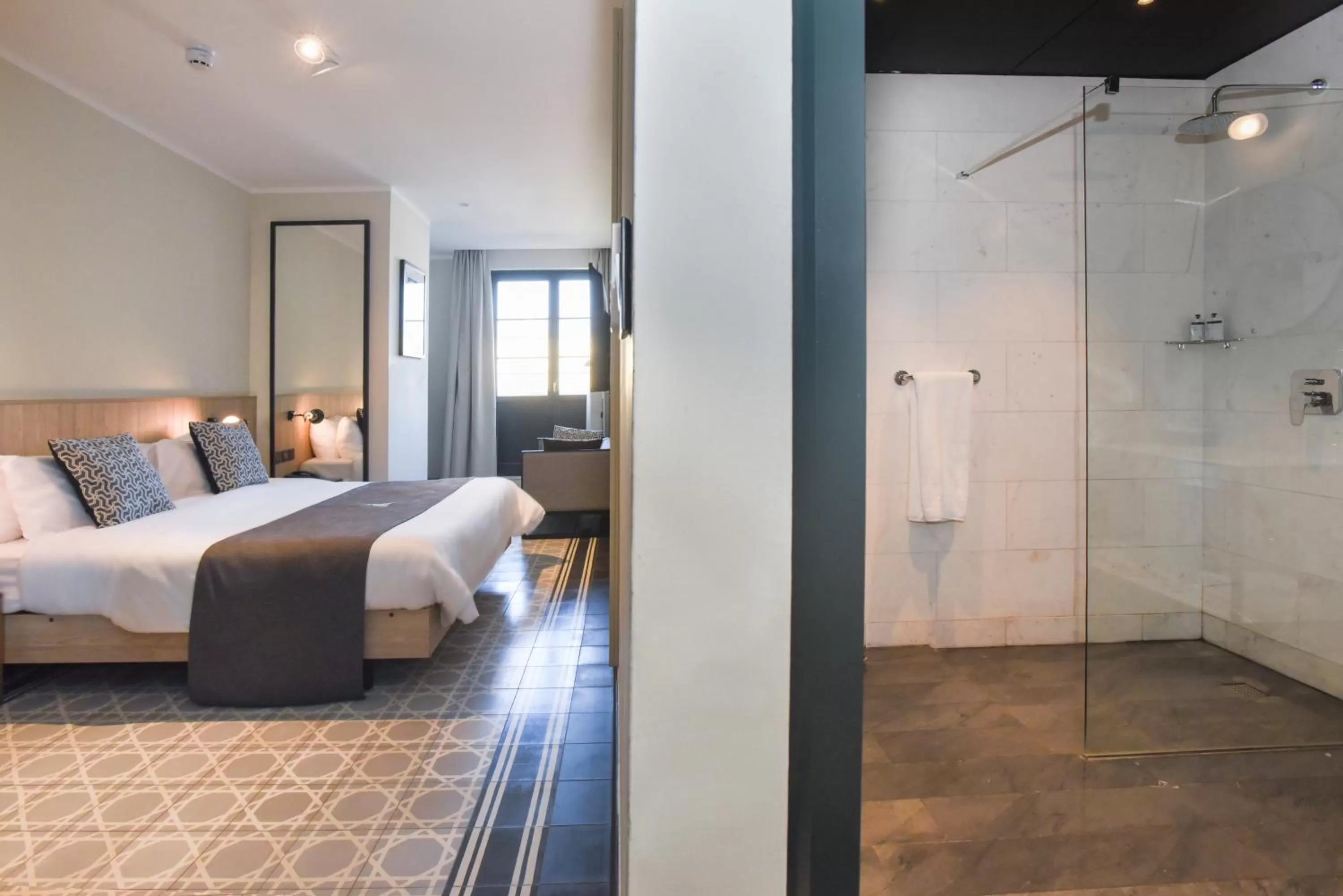 Bed in La Falconeria Hotel