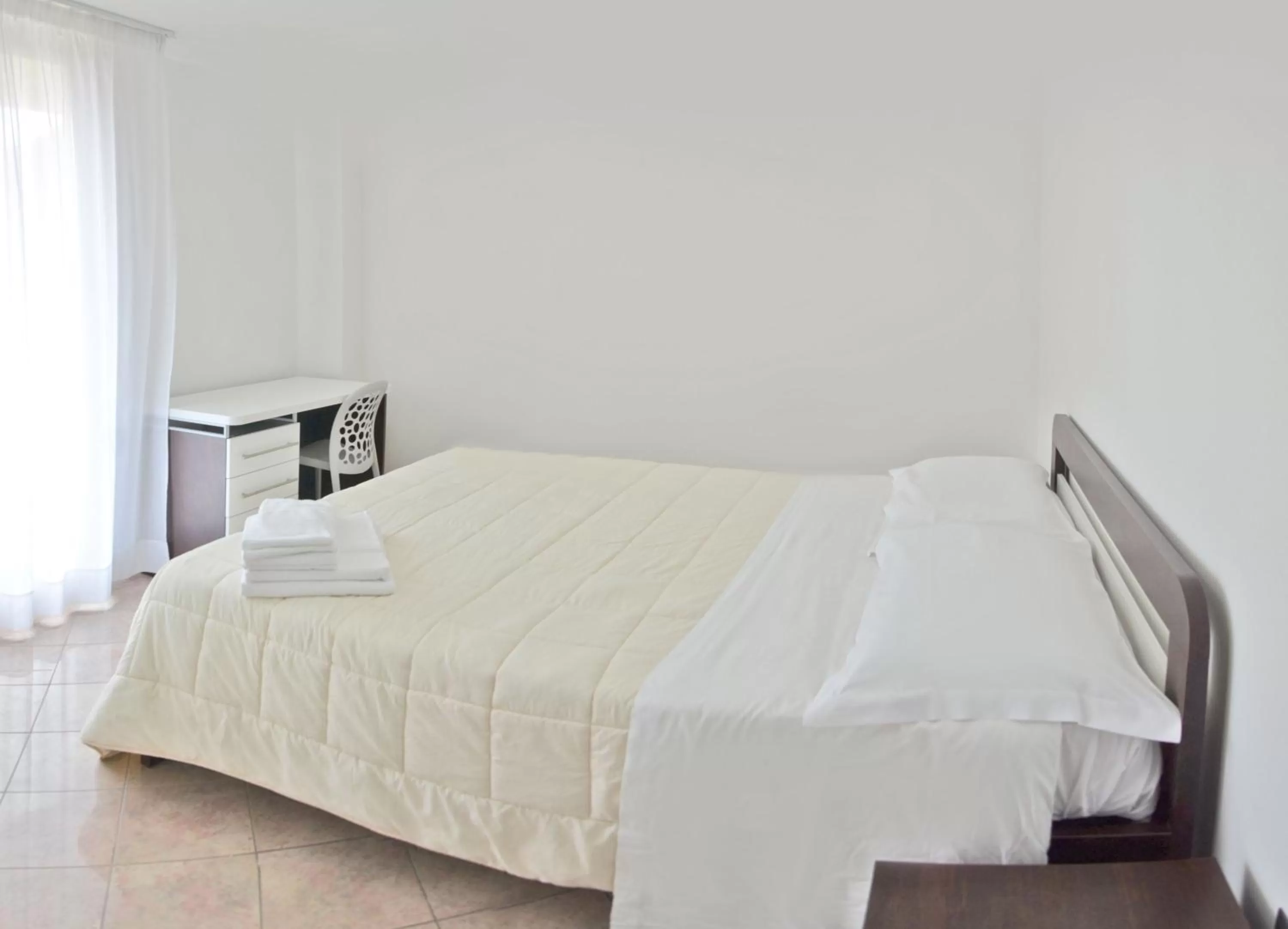 Bed in Vea Resort Hotel