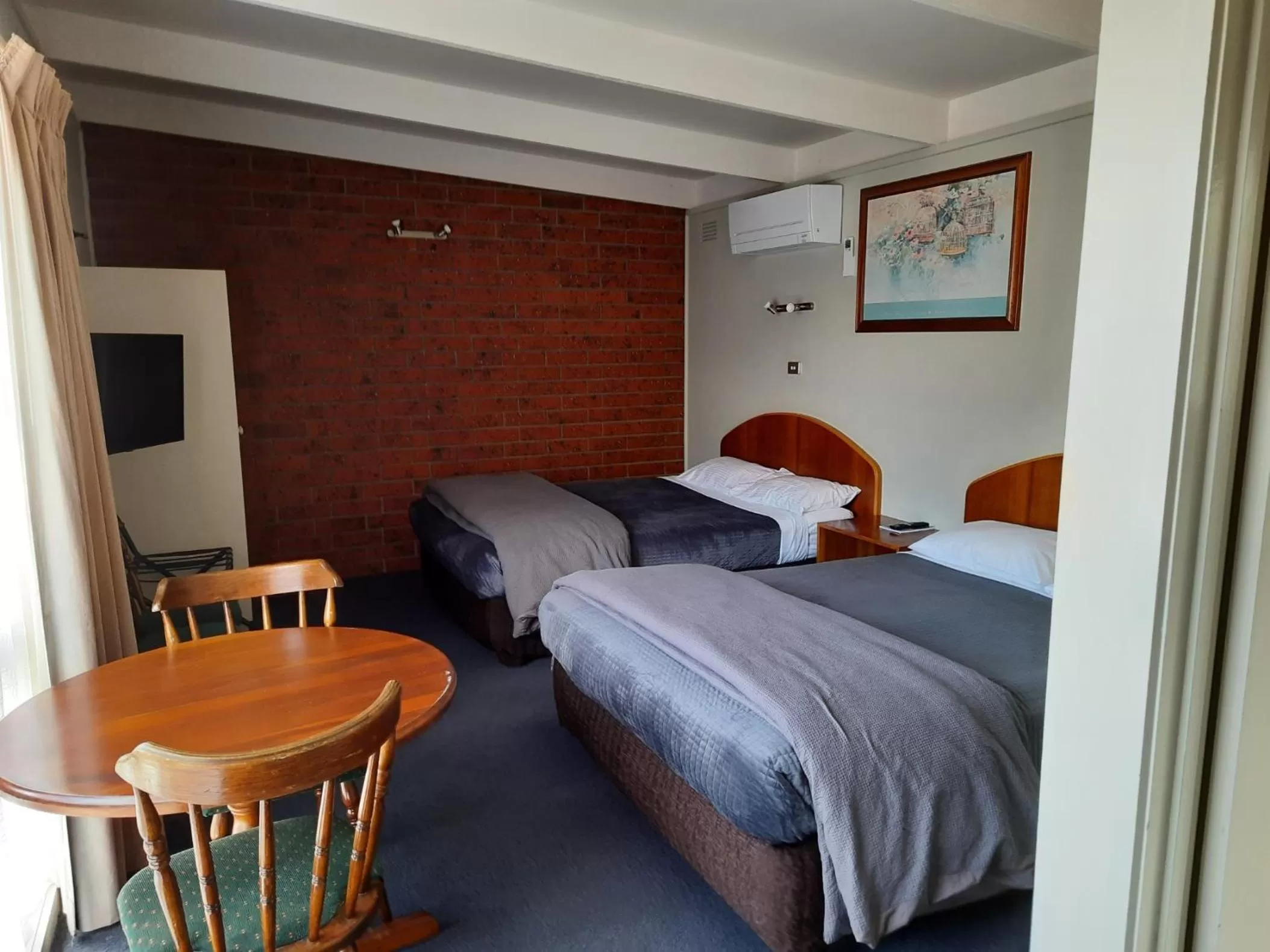 Bed in Abbotswood Motor Inn