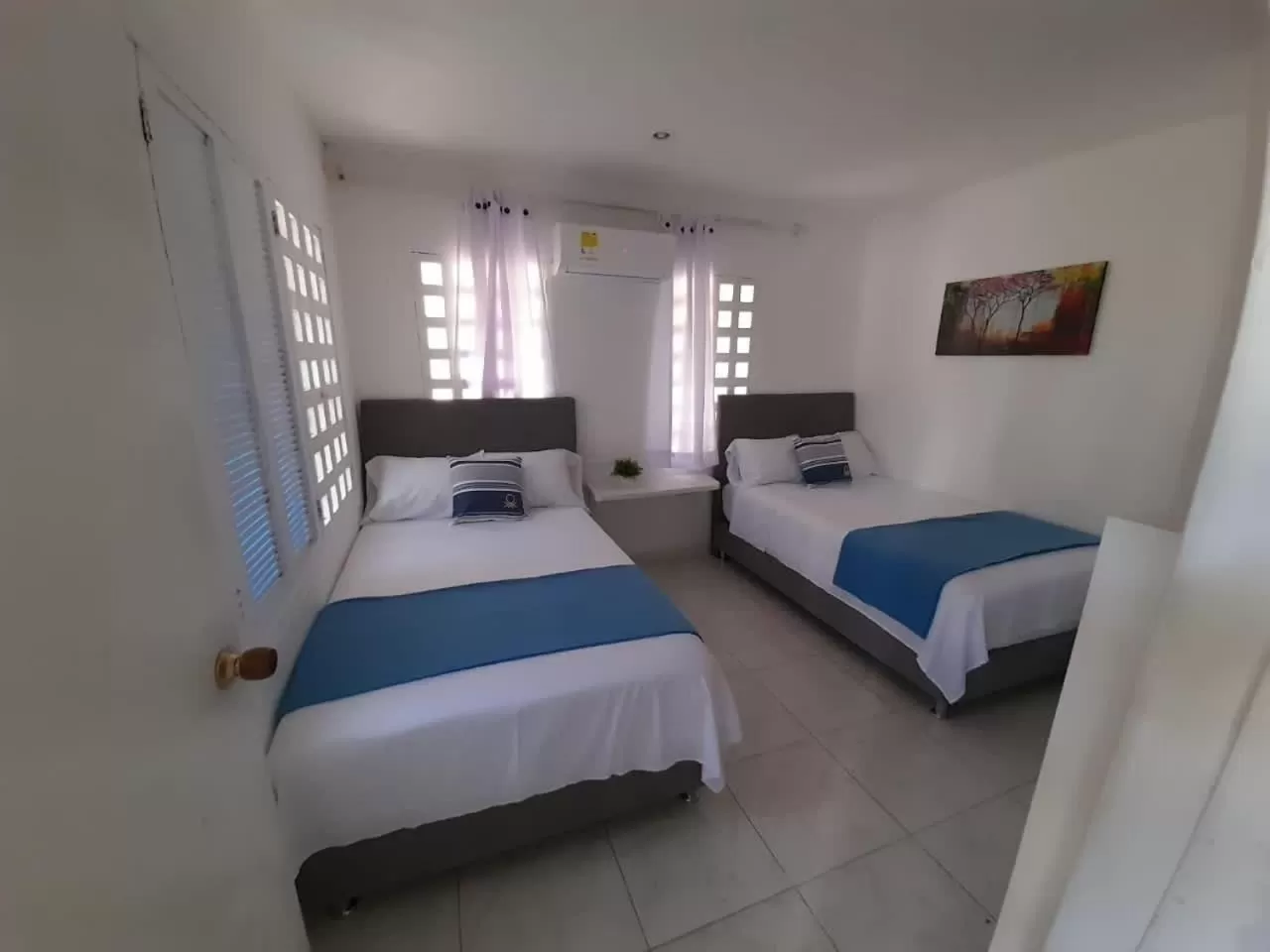 Bed in Tita’s Airport Hotel